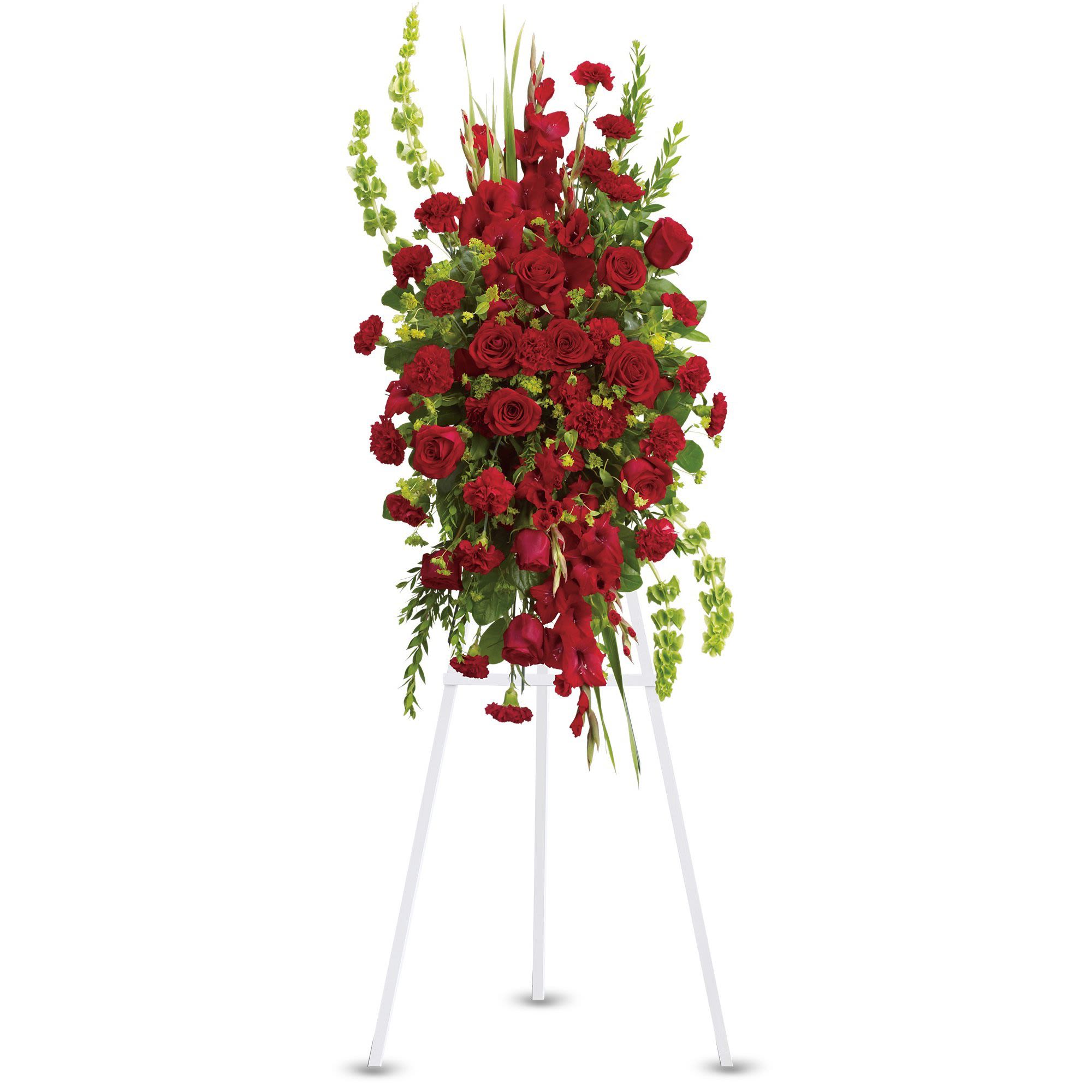 Care and Compassion Spray by Teleflora - Your care and compassion will be appreciated by all who lay eyes on this radiant standing spray. A variety of lovely vibrant red blossoms contrasted by vivid green of bells of Ireland will deliver your heartfelt condolences. Perfectly.