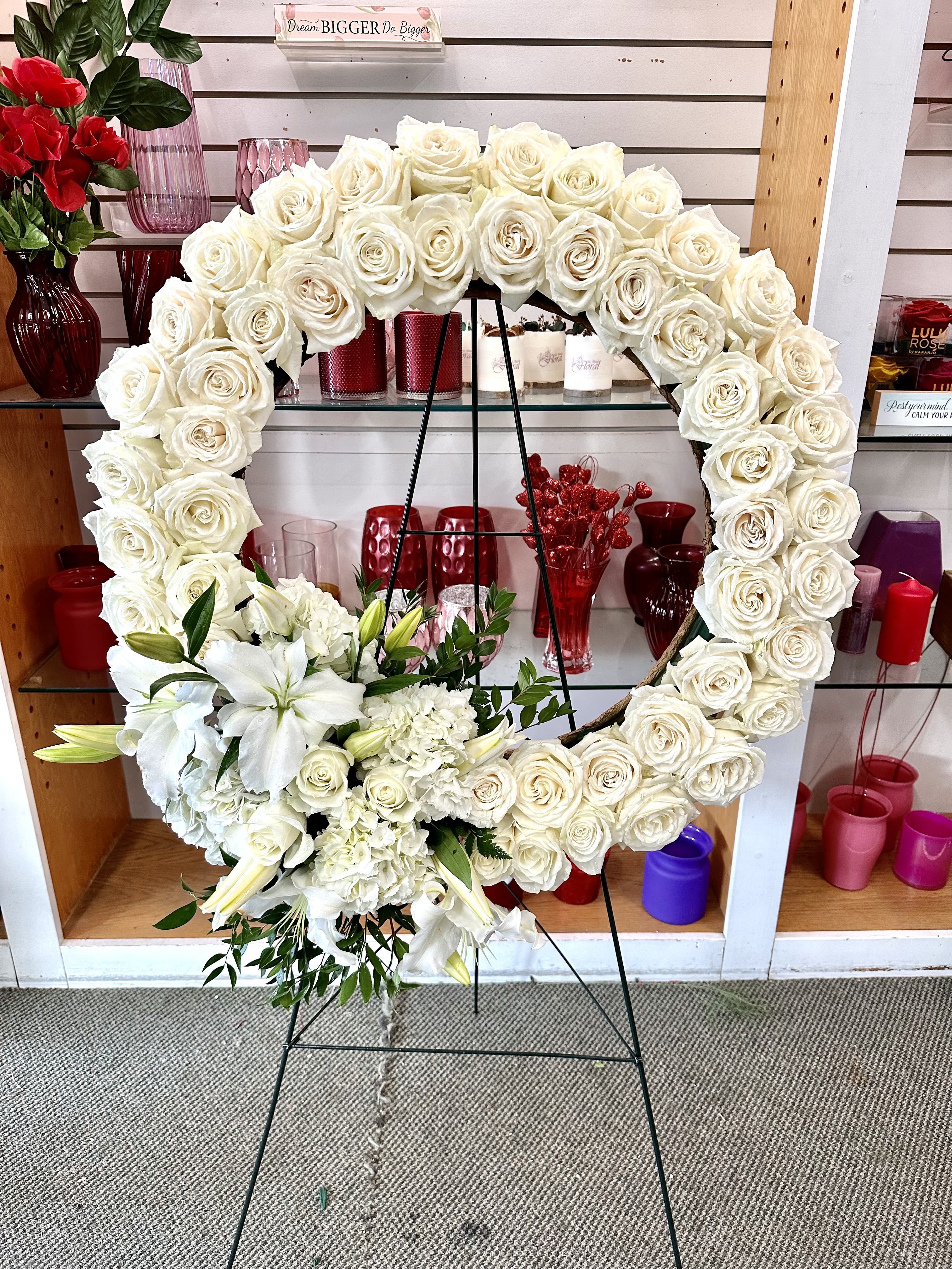 Simple But Elegant Wreath - This wreath is made of 50 Playa Blanca Roses, Hydrangeas and Oriental Lilies. Demension of wreath is 24".