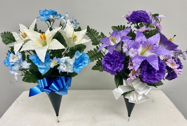 Two cone-shaped floral bouquets with blue-white and purple-white flowers