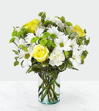 OH' HAPPY DAY - It's amazing the effect flowers can have on its recipient. Through a collection of yellow roses and white daisies, this bouquet is sure to bring a smile to the face of whoever it's given to. 