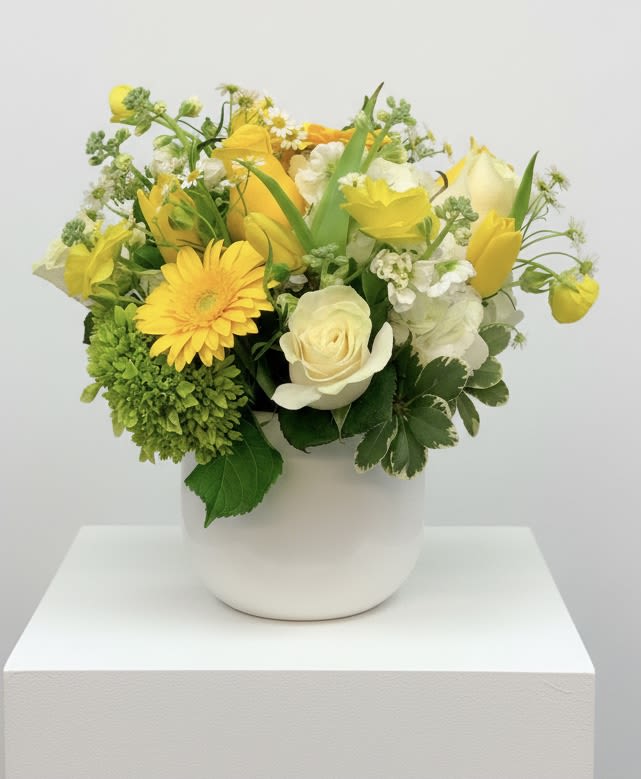 Limoncello - Beautiful white and yellow blooms accented with greenery 