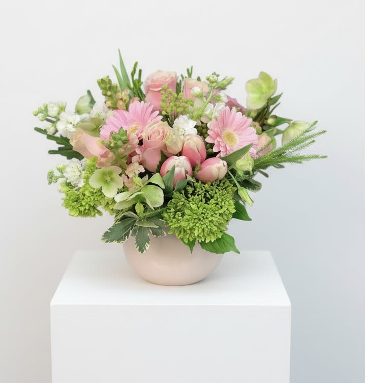 Make Her Day - Sweetly sophisticated, this arrangement of green miniature hydrangea and light pink spray roses, accented with  seasonal pink flowers 