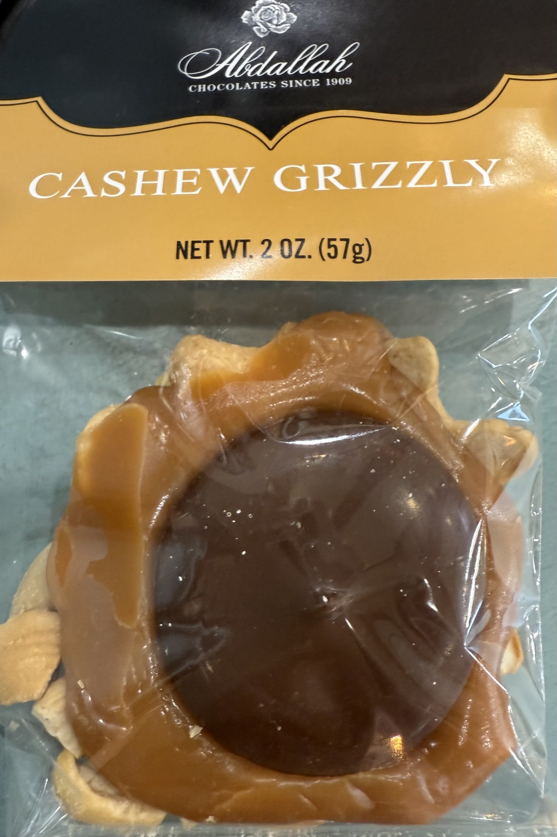 Abdallah Cashew Grizzly - Cashews topped with smooth creamy caramel and milk chocolate.