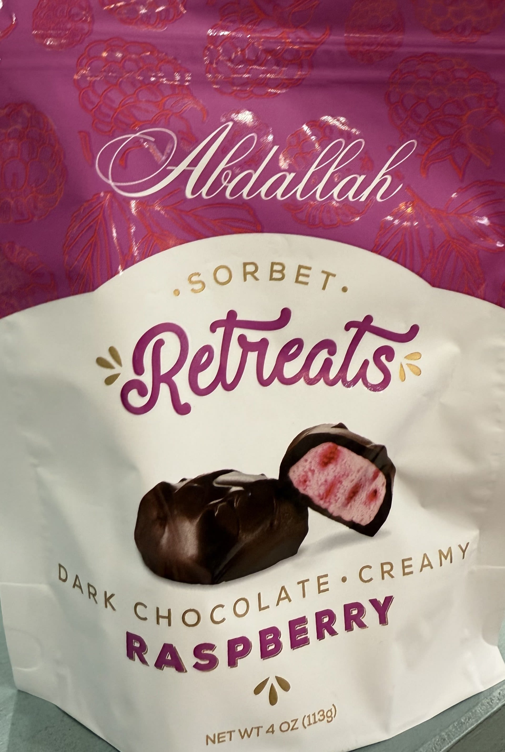 Abdallah Raspberry Sorbet - Creamy raspberry sorbet center with real raspberry pieces covered in dark chocolate