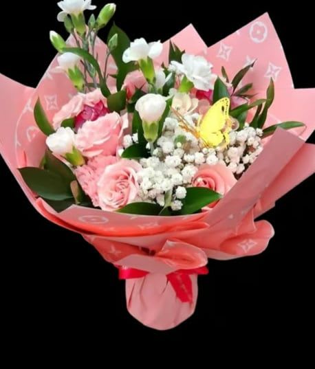 Garden Bouquet - The garden flower bouquet design is inspired by a mix of roses and clabelles and green foliage decorated with decorative paper.