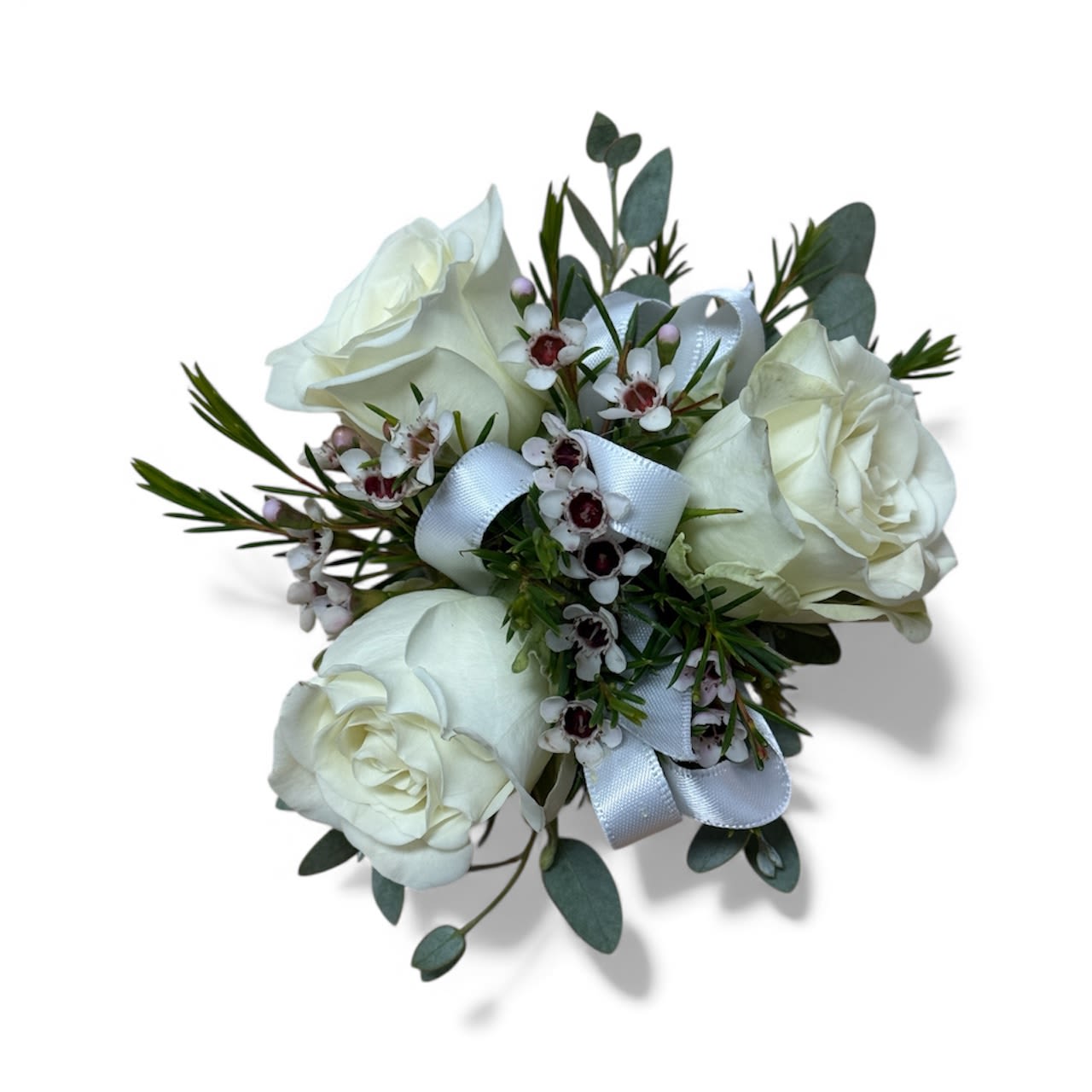 Stems Original Corsage - 3 petite roses, white accent flower, eucalyptus, tree fern, bow. If you have a preferred rose/bow color let us know and we will do our best to match!