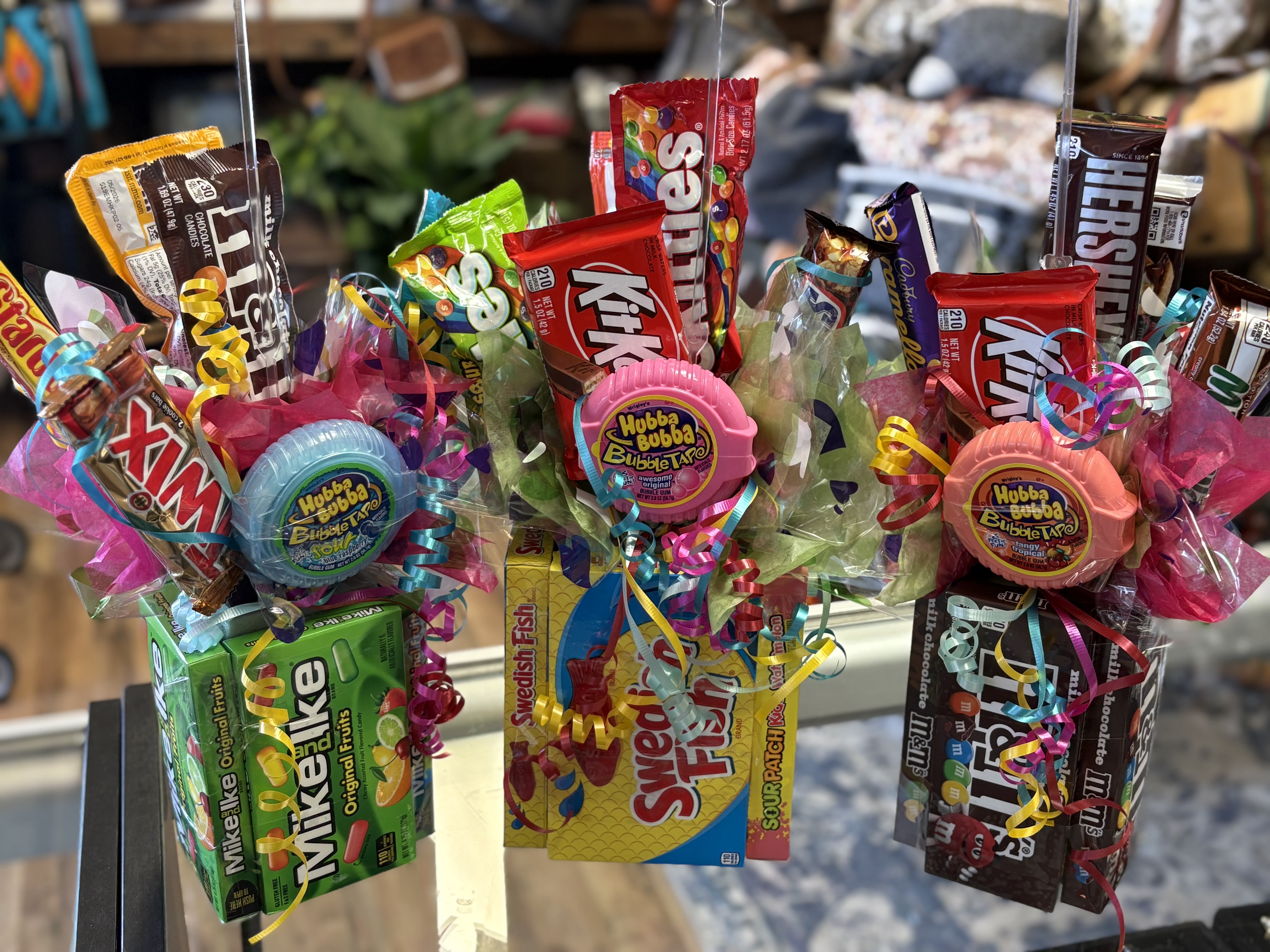 Bloomin Sweets  - Bloomin Sweets Candy Bouquet.   Bright, fun, and delicious—our candy bouquet is the perfect gift for any occasion! Each bouquet is artfully arranged with an assortment of candies, designed to look like a cheerful bouquet of flowers (but even better, because you can eat it!). Whether you’re celebrating a birthday, saying thank you, or just wanting to brighten someone’s day, this sweet arrangement is sure to bring a smile.