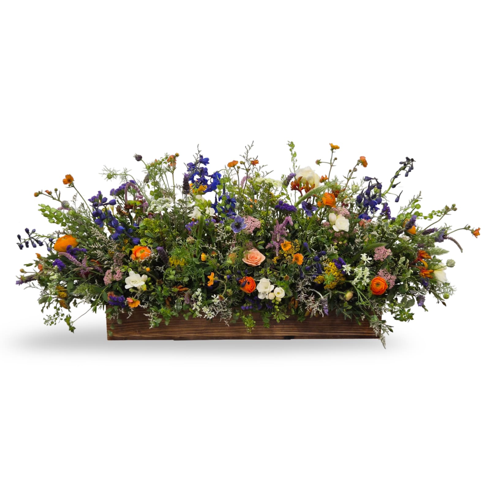 Botanical Garden - Select this lush spring centerpiece bursting with bright season florals and fresh greenery. Designed in a wooden box for charming, garden-inspired look.  Approximately 20” x 40” x 20”