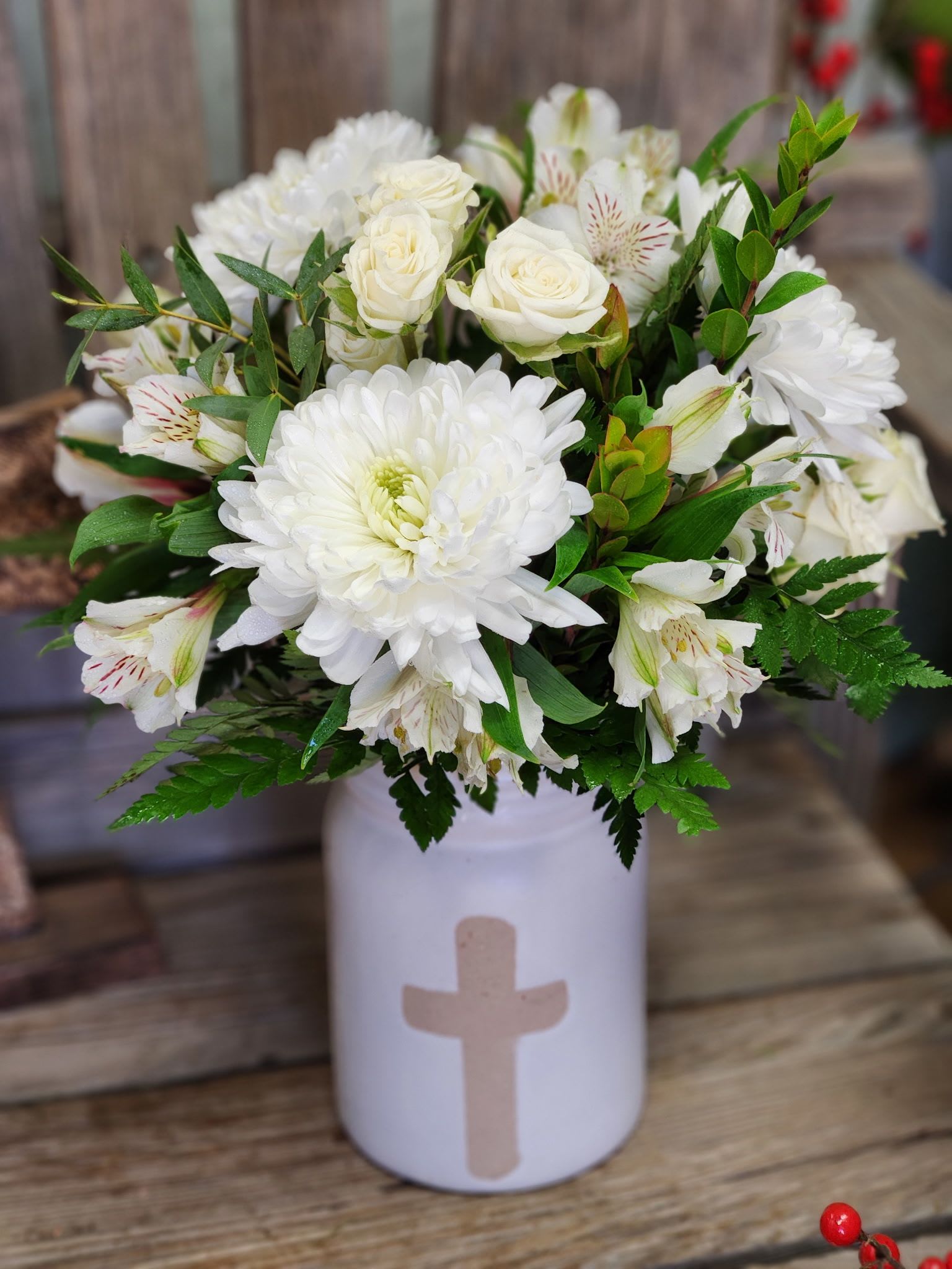 Peace and Faith - Send soothing wishes with peaceful white flowers and a reminder of deep faith. This beautifully glazed ceramic vase makes a lovely keepsake. 