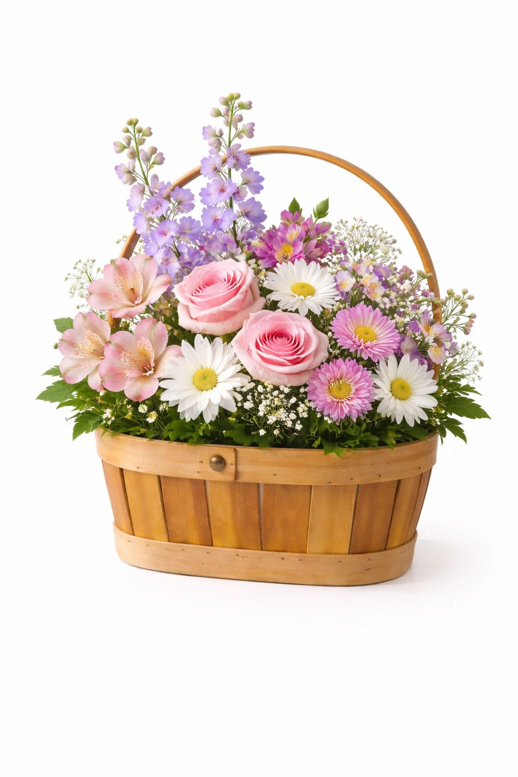 Spring Garden Basket - A charming garden-style floral arrangement designed in a classic wooden basket. Soft spring colors and fresh greenery create a light, natural look that brings the feeling of a blooming garden indoors.  Better For: Spring celebrations, Easter gifts, Birthdays, Thank you gestures, Get well wishes, Just because.  Flowers and basket may vary based on seasonal availability. Our designers will select the freshest blooms while maintaining the same overall style and color palette. 