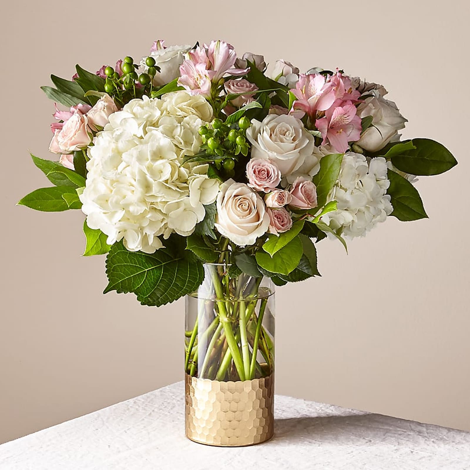 For Mom Rose All Day Bouquet - A stunning blend of blush roses, hydrangeas, spray roses, and seasonal accents, this large, elegant arrangement adds refined beauty to any space.   Perfect for sophisticated celebrations, heartfelt gifts, or as a breathtaking centerpiece, it’s designed to enrich any room with its timeless charm.  Approximate Size: 17" H x 15" W. Order now to elevate any occasion with a touch of elegance! 