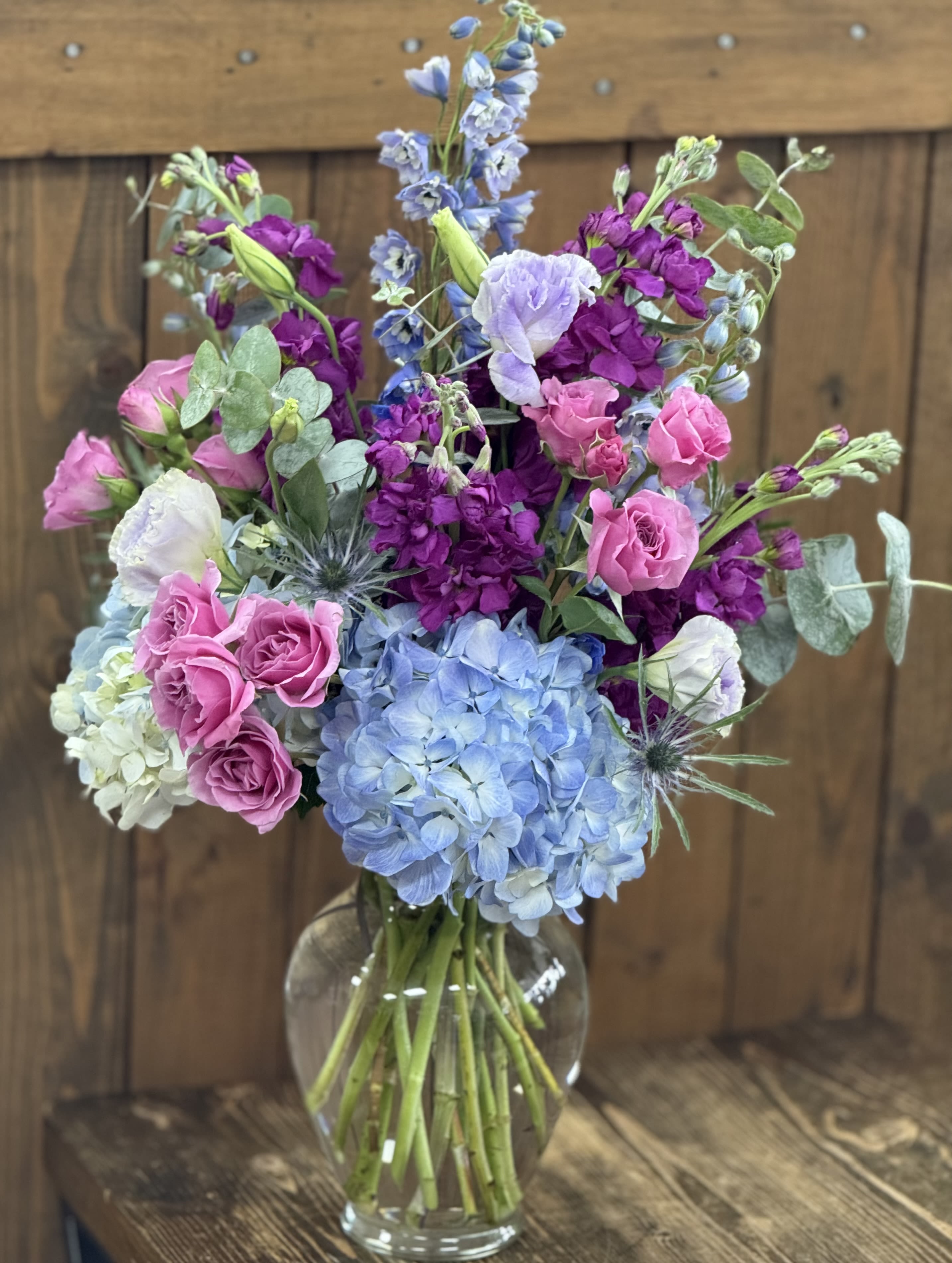 The Gilded Bloom - A lush opulent design overflowing with rich jewel tones that feel regal and dramatic. 