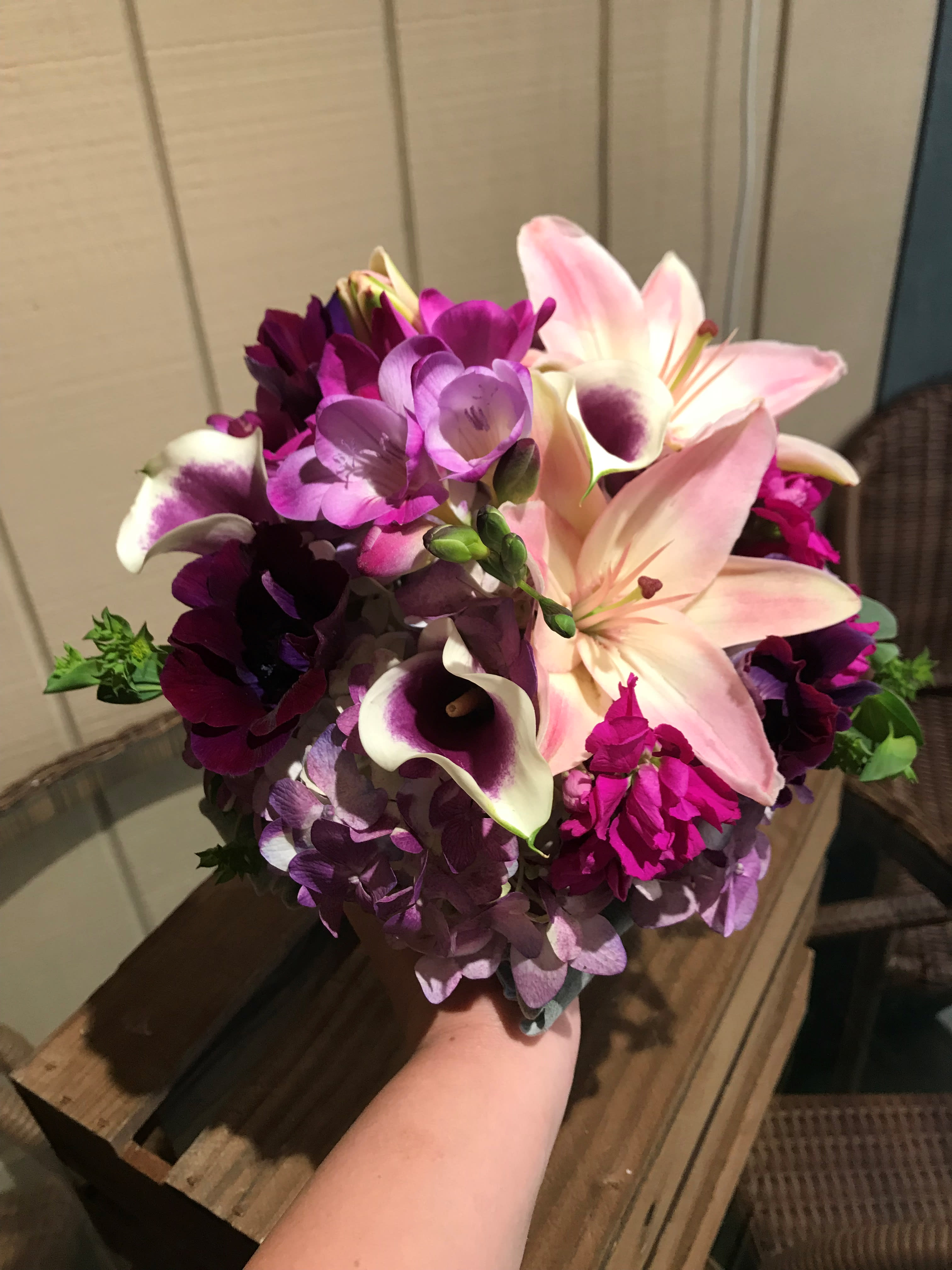 Purple Passion - A gorgeous clutch bouquet made up of lush purple and lavender tones. 