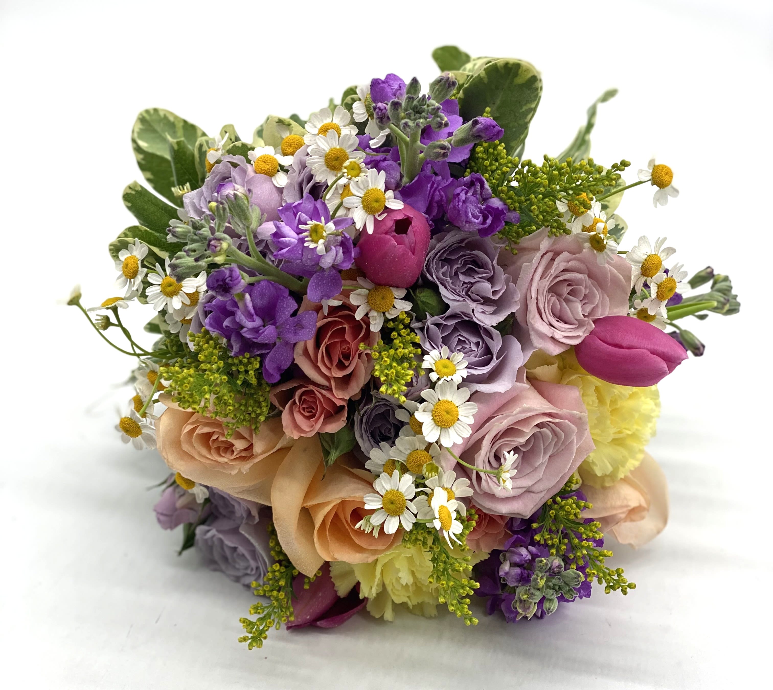 Meadow Muse Bouquet - A beautiful mix of soft tones - lavender roses, pale yellow carnations, purple stock, peach spray roses and more! Great compliment to several different dress colors!!