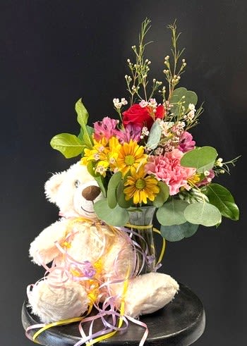 #A011 - Sugar, Spice, &amp; Everything Nice! - This sweet (no pun intended!) arrangement makes you think of the first time you held your new baby.  The love poured from you into them and you knew your world would never be the same.  Share that feeling with someone you know.