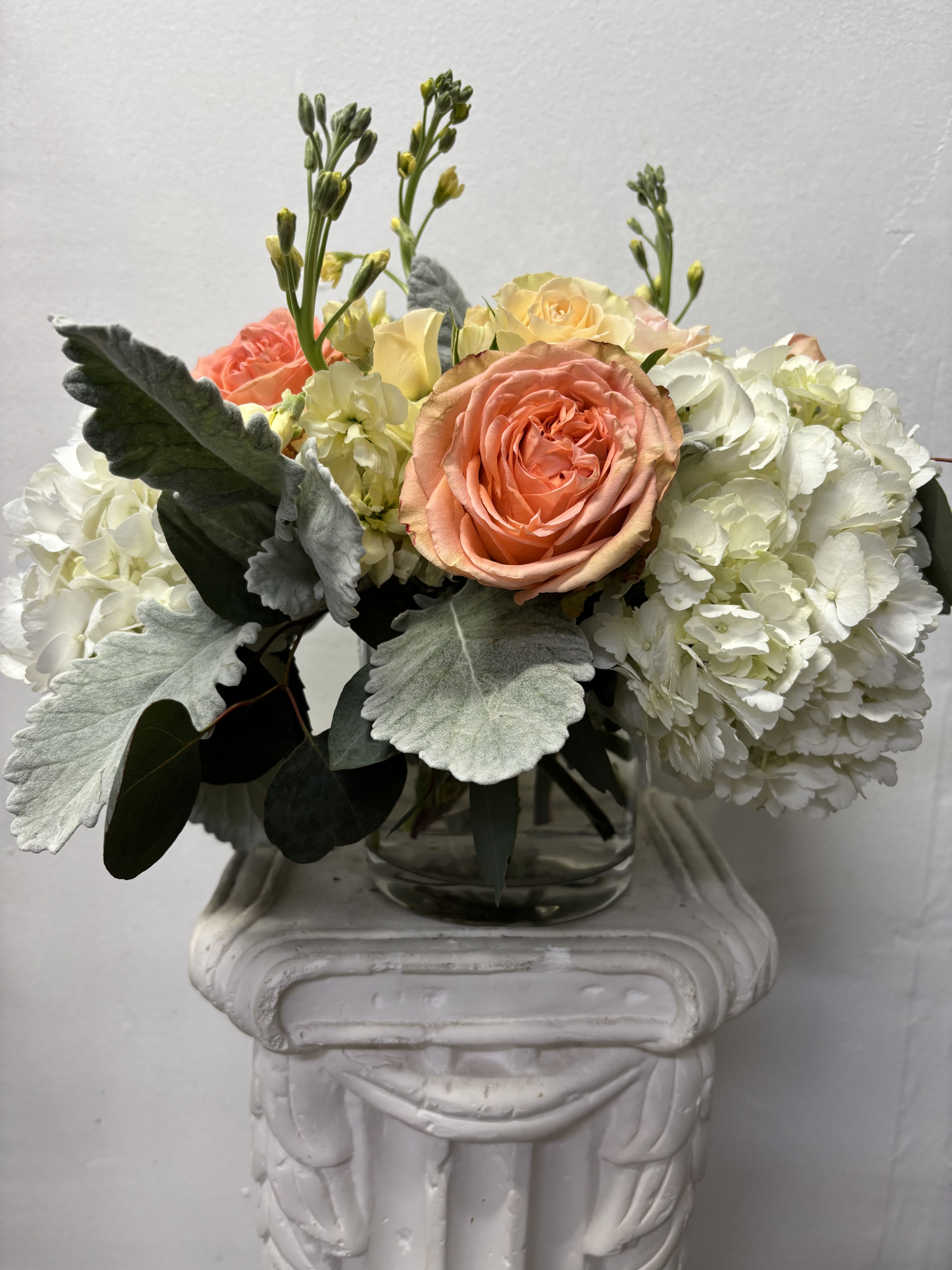 Lighter Day - Lighten the day with the orange and yellow glow  of roses and white hydrangeas.