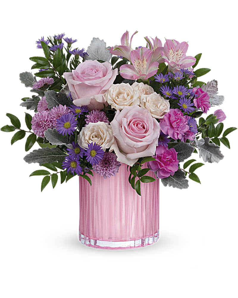 Rosy Pink Bouquet  - Rosy, radiant and perfectly posh! Rosy Pink Bouquet with a fabulously feminine arrangement in a pearlescent pink glass vase with sculpted details is the perfect Mother's Day surprise.  Pink roses, pink spray roses, pink alstroemeria, miniature hot pink carnations, lavender button spray chrysanthemums and large purple monte cassino asters are arranged with dusty miller and huckleberry.