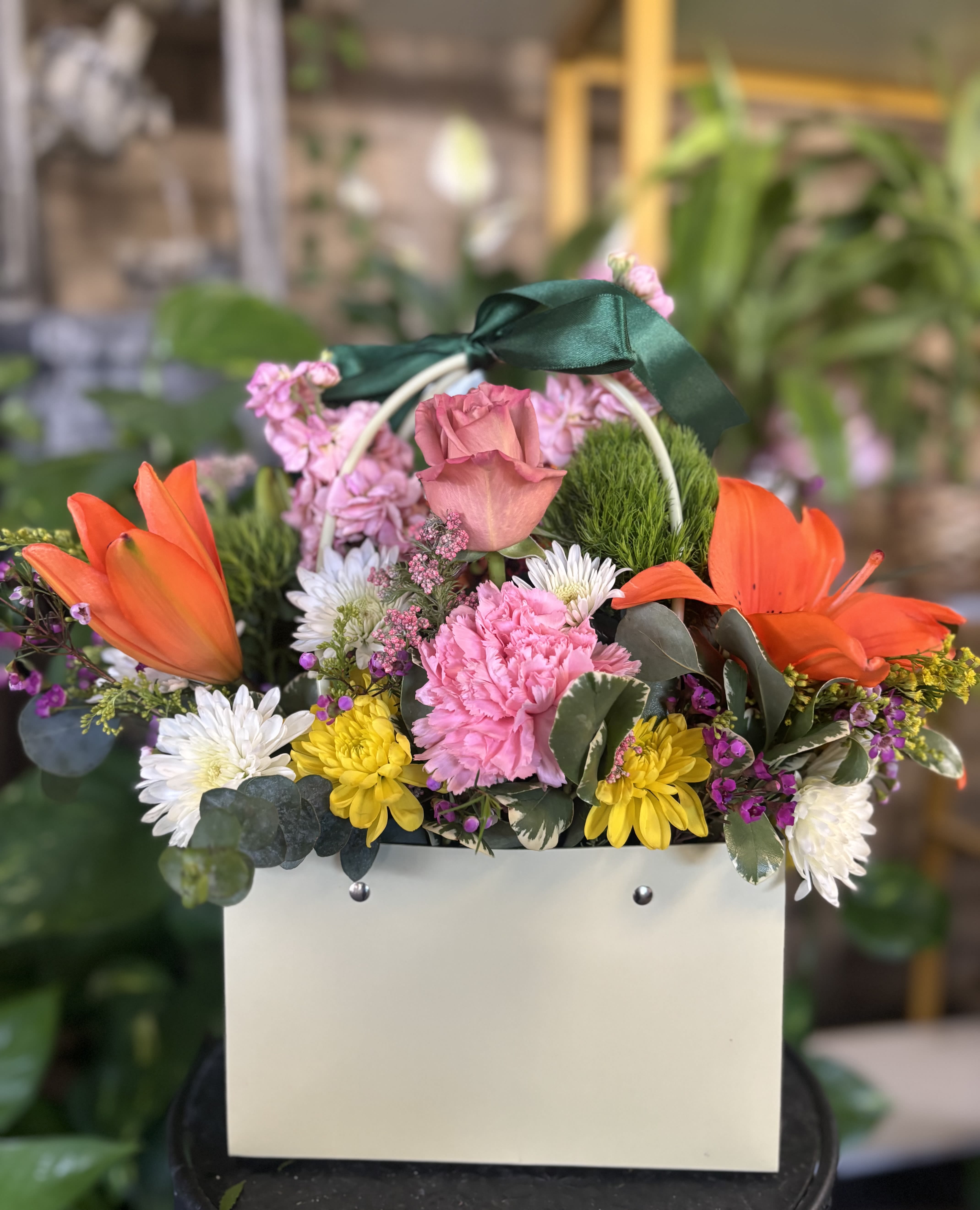 Purse FLORAL  - Fresh floral in purse setting 