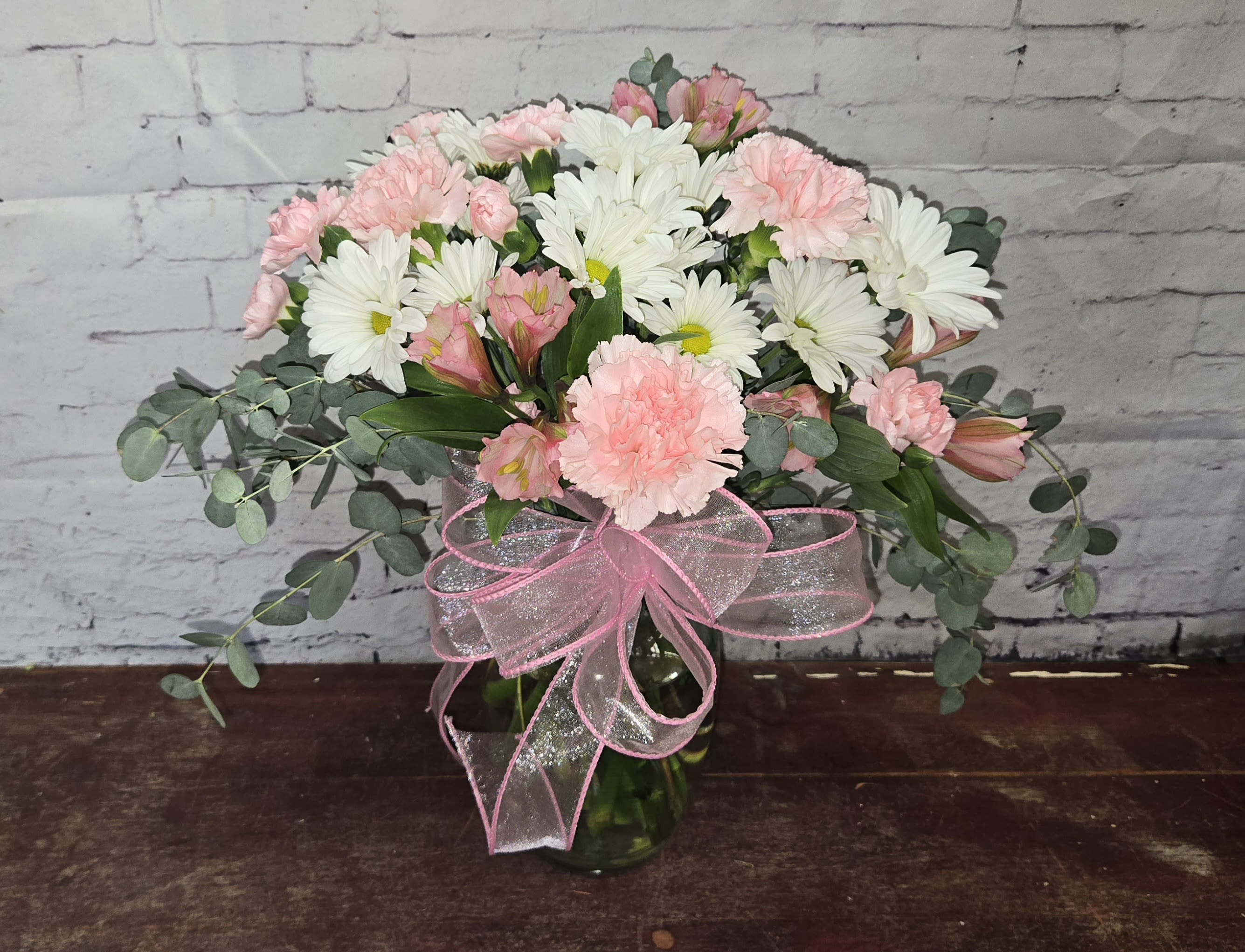 XOXO - Soft and delicate, this pale pink and white bouquet will send lots of X &amp; O's. 
