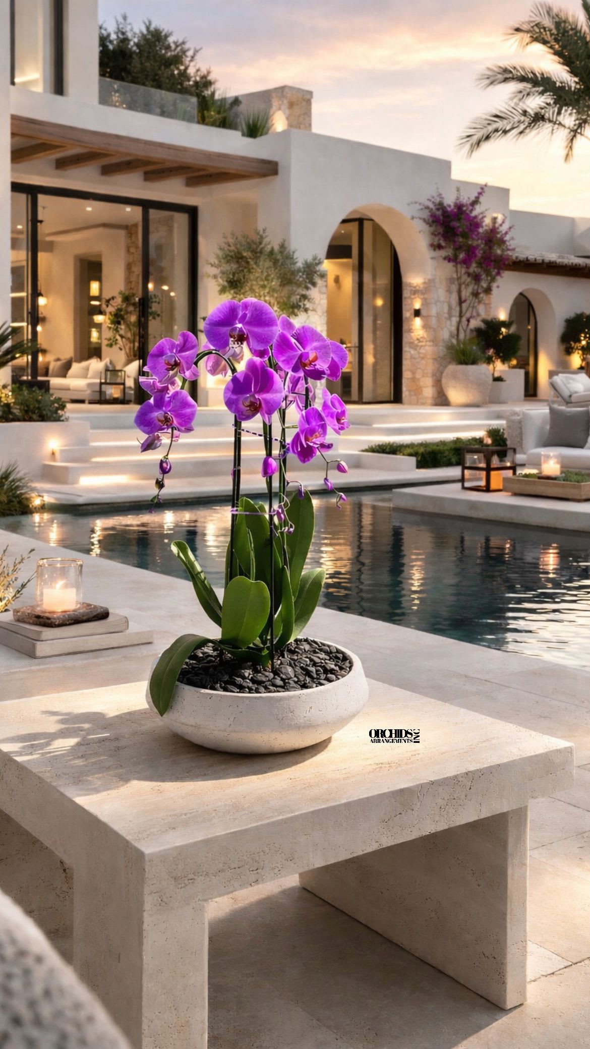 Purple Phalaenopsis Orchid – Dining Table Centerpiece - This elegant Triple Purple Phalaenopsis Cascade orchid arrangement creates a striking vertical presence, making it ideal for grand interiors and modern living spaces with a vase 13" D X 4.5" T. 