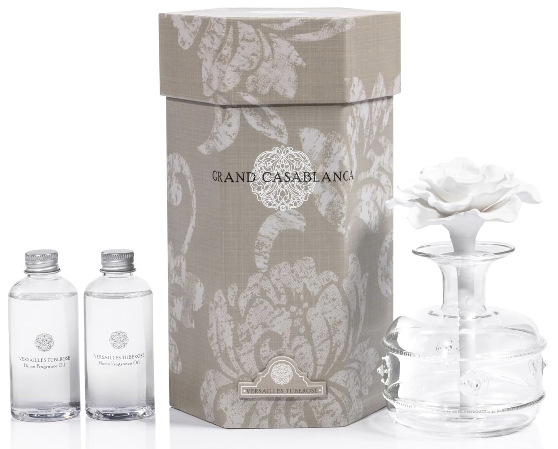 Zodax Grand Casablanca Porcelain Diffuser: Versaille Tuberose - A fragrant blend of Tahitian Tiare Blossoms, French Tuberose, White Heirloom Lilac, Muguet, Ceylonese Sandalwood, sheer Vanilla, and Musk. Its elegant and beautiful design makes it the perfect decor for any room. Set includes one glass bottle, one porcelain flower and two bottles of oil. Tax free. Same day hand delivery.  Shop the best gift items in Wilmington, Delaware at your local florist and gift shop. From fresh floral arrangementsand gourmet treats to unique seasonal décor and thoughtful gifts for any occasion, we offer carefully curated selections to delight your loved ones. Perfect for birthdays, anniversaries, holidays, or special celebrations, each gift is crafted with quality and care. Enjoy same-day delivery in Wilmington, DE, and surrounding areas, making it easy to send joy, love, and celebration right to their doorstep.