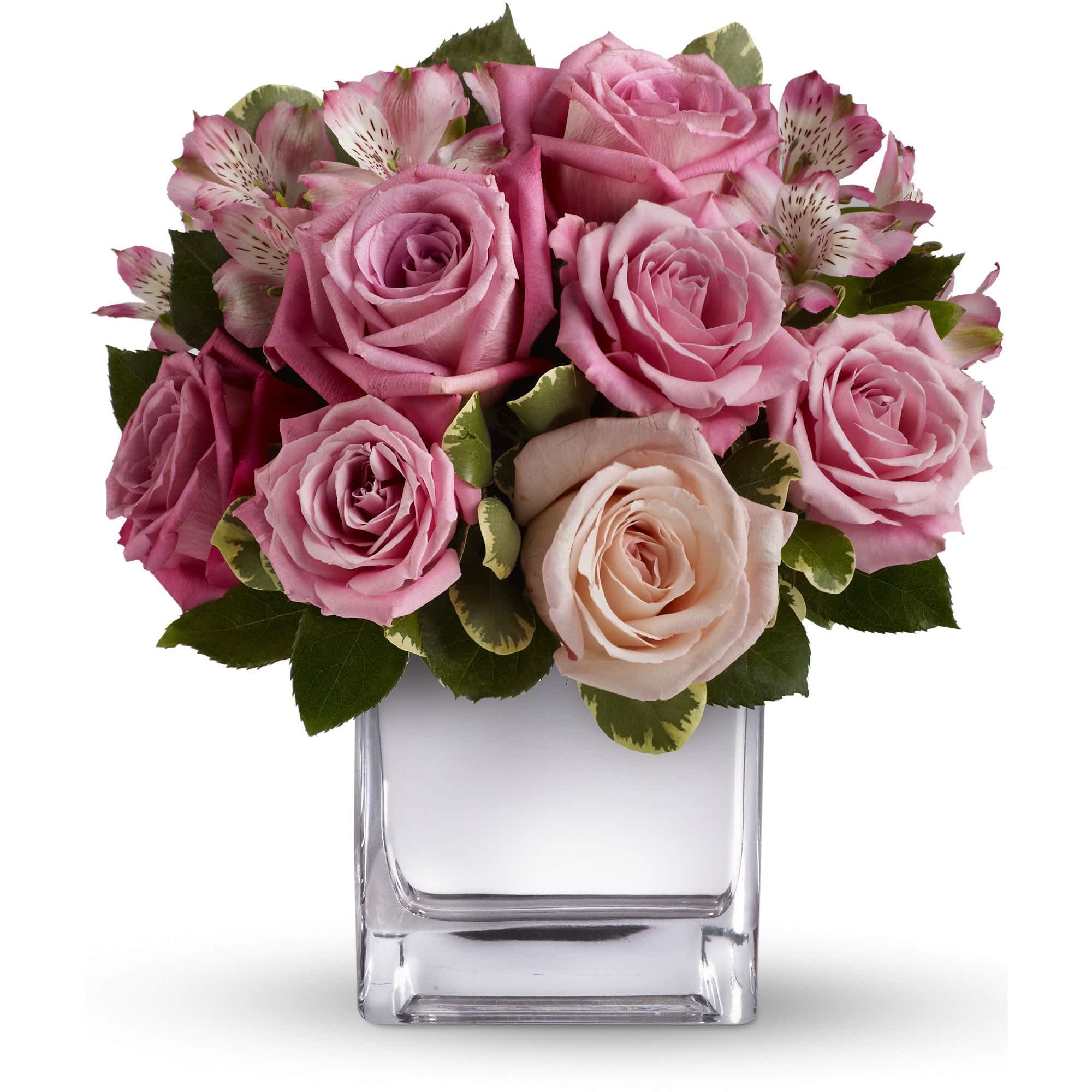 Teleflora's Rose Rendezvous Bouquet - This tastefully terrific bouquet features soft pink and lavender roses in a sleek contemporary silver cube vase. Understated and spectacular at the same time, it is a gorgeous gift that she'll long remember.  