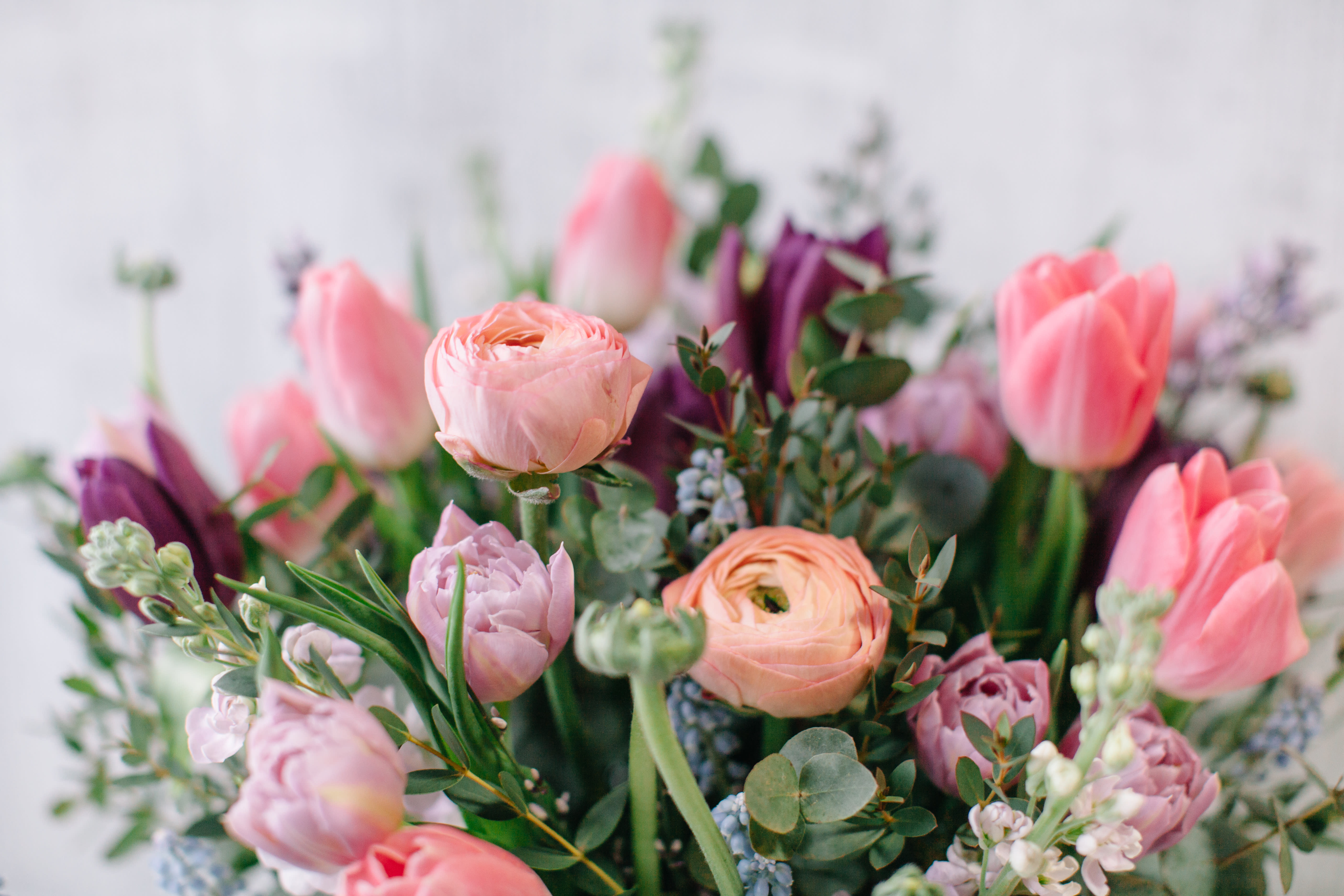 Bouquet Wrapped in Paper- No vase - Reserve one of our fresh hand-wrapped bouquets, which will be available for pickup in the shop. We recommend gifting it soon after pickup, so that the blooms can be cut and placed in water.  Perfect for graduations, ceremonies, and rehearsals to be presented, or just as an everyday gift for someone who has plenty of vases at home! This will be a mix of garden-style flowers and pretty lush paper.