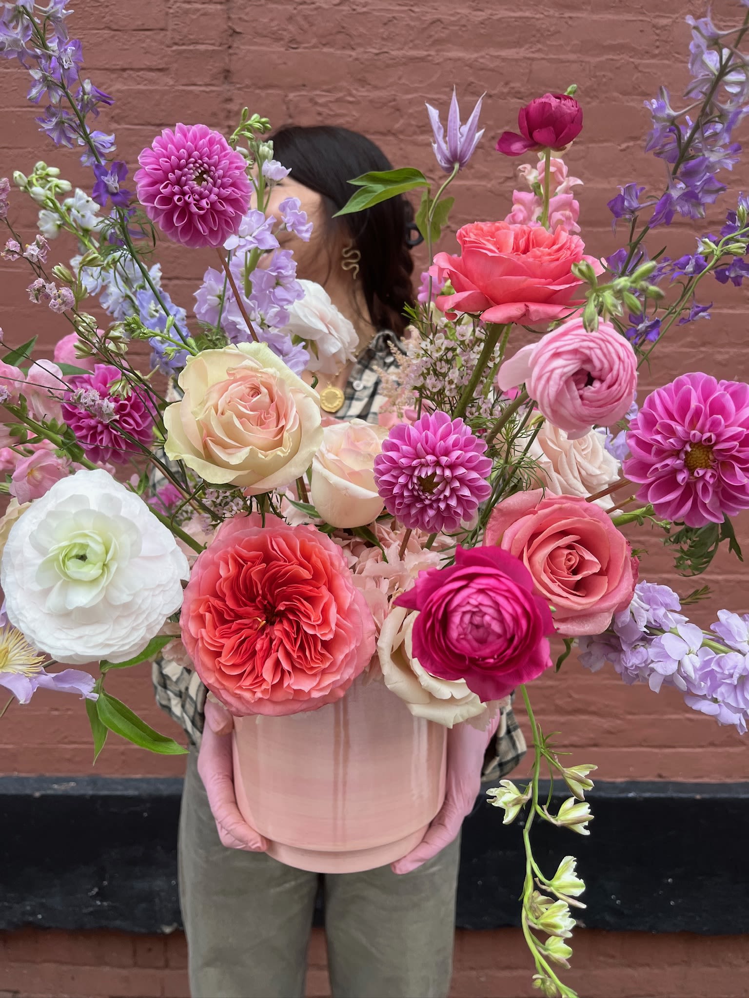 Petal Sonata - Custom arrangement — can be tailored to your color and style preferences.  A modern garden dream where color, texture, and form meet in perfect harmony. Featuring premium blooms such as ranunculus, garden roses, peonies, hydrangeas, sweet peas, lisianthus, orchids and many more in your chosen palette, this arrangement dances with movement and grace.  Designed in a premium ceramic vase, Petal Sonata is equal parts romantic and modern — a statement piece that brings artful energy to any space.  Perfect for: birthdays, celebrations, or simply brightening someone’s day.