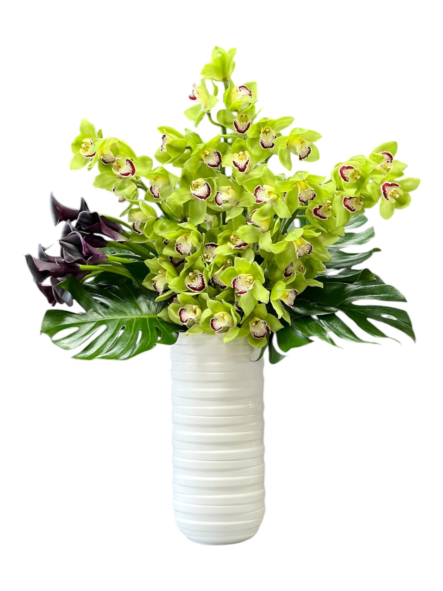 Skyscraper - Green Cymbidium Orchids and Calla Lilies adorned with Monstera leaves