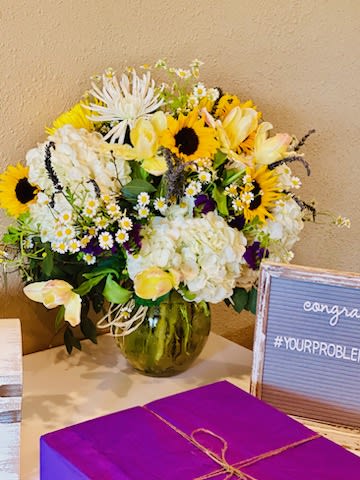 Wild Country - This wild mix of bright sunflowers, big white clouds of hydrangea, French yellow tulips, wild daisies, white chrysanthemums and fresh lavender with lavish greenery all around will make you feel right in the heart of the country. Perfect for any occasion in your household. *Vases may vary