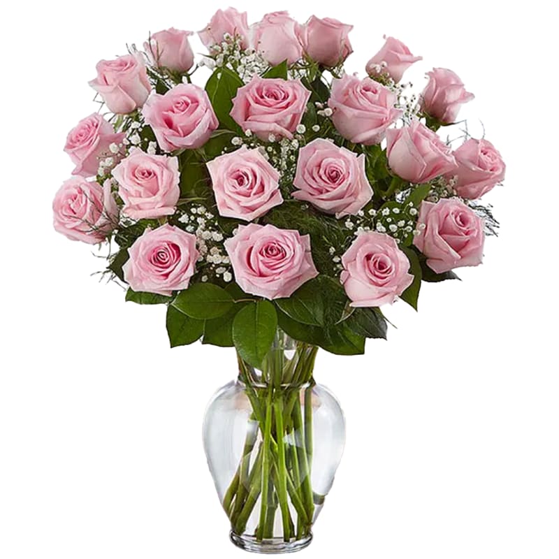 2 Dozen Long Stem Pink Roses - Soft, elegant, and beautifully full, this stunning arrangement of two dozen long stem pink roses is a heartfelt way to express love, appreciation, and admiration. Pink roses are known for their gentle beauty and symbolic meaning of gratitude, affection, and sweetness, making this bouquet both meaningful and versatile.  Expertly arranged with fresh greenery and delicate filler flowers, this generous rose bouquet is perfect for Valentine’s Day, anniversaries, birthdays, or celebrating someone truly special. With twice the blooms and timeless charm, these long stem pink roses create a lasting impression and turn any occasion into something unforgettable.