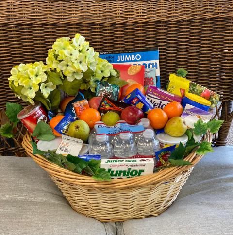 Fruit and Gift Basket Galore - This basket is filled with delicious fruit, drinks, and snacks all of kinds. All of our baskets are made to order  and always fresh. 