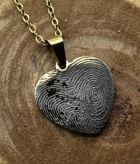 Heart Fingerprint  - Keep your memories close with our Fingerprint heart necklace, place your order here, wash your hands thoroughly, make sure that you take a clear photo directly above the finger, and send to  sales@rosewoodandrust.com, or stop by the shop and we will take your finger print for you 