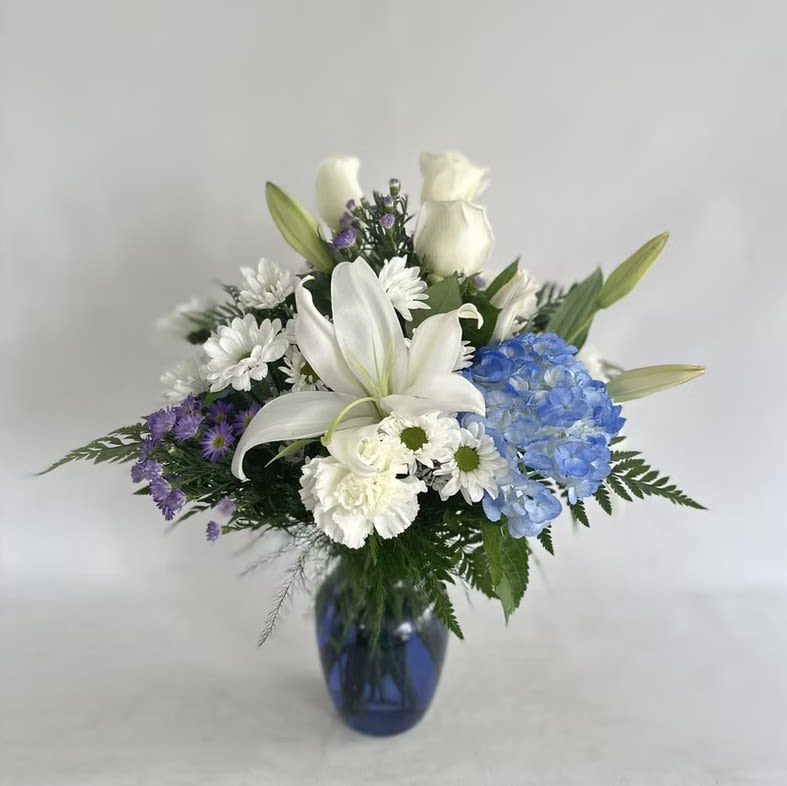 SV1 - Website Sympathy Vase - Flowers and containers are subject to substitution and availability.