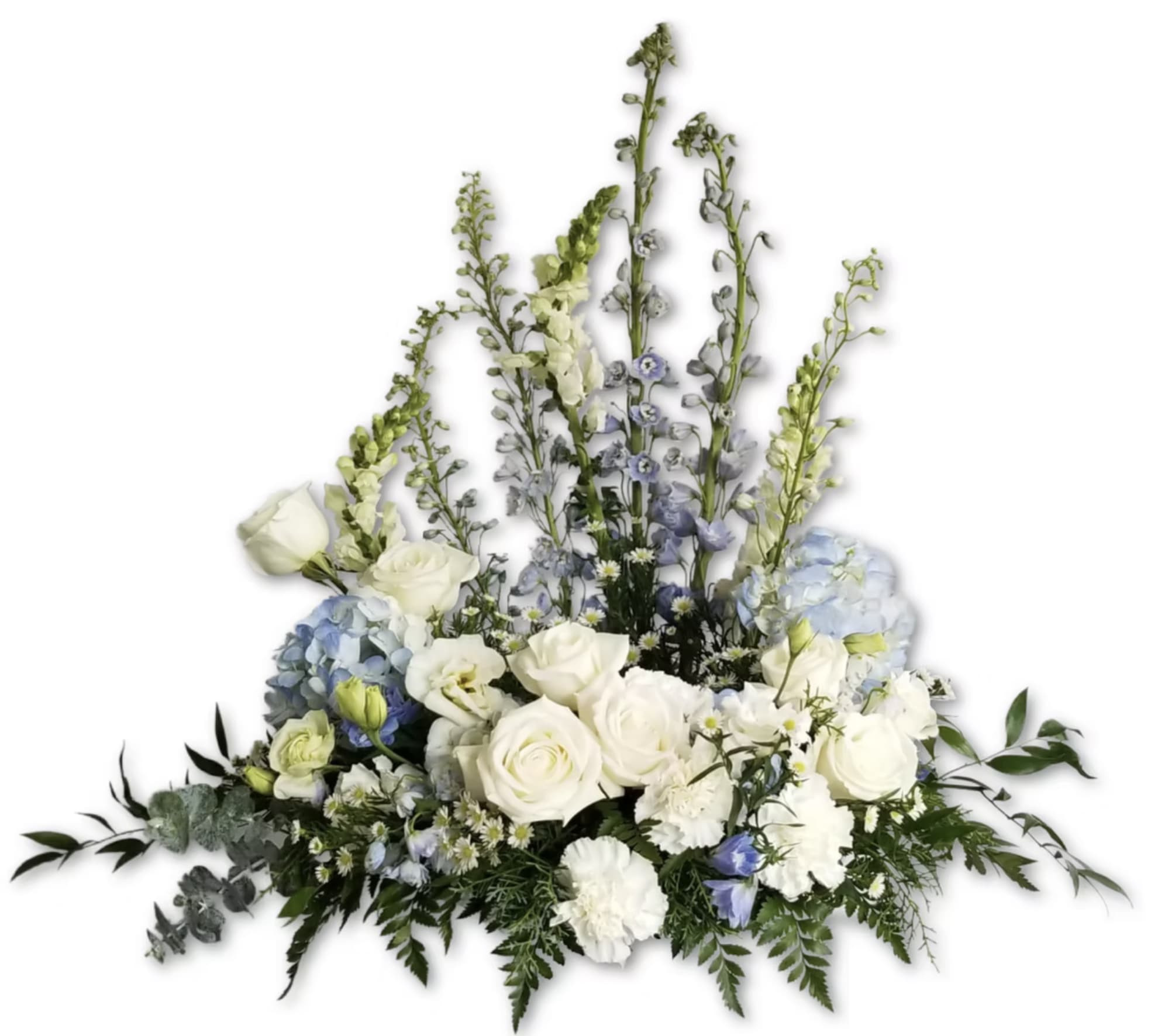 US5 - Website Blue Skies Urn Spray - Flowers and containers are subject to substitution and availability.