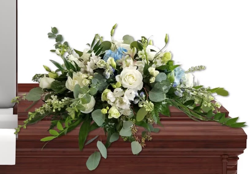 CS11 - Website Casket Spray - Child - Flowers are subject to substitution and availability.