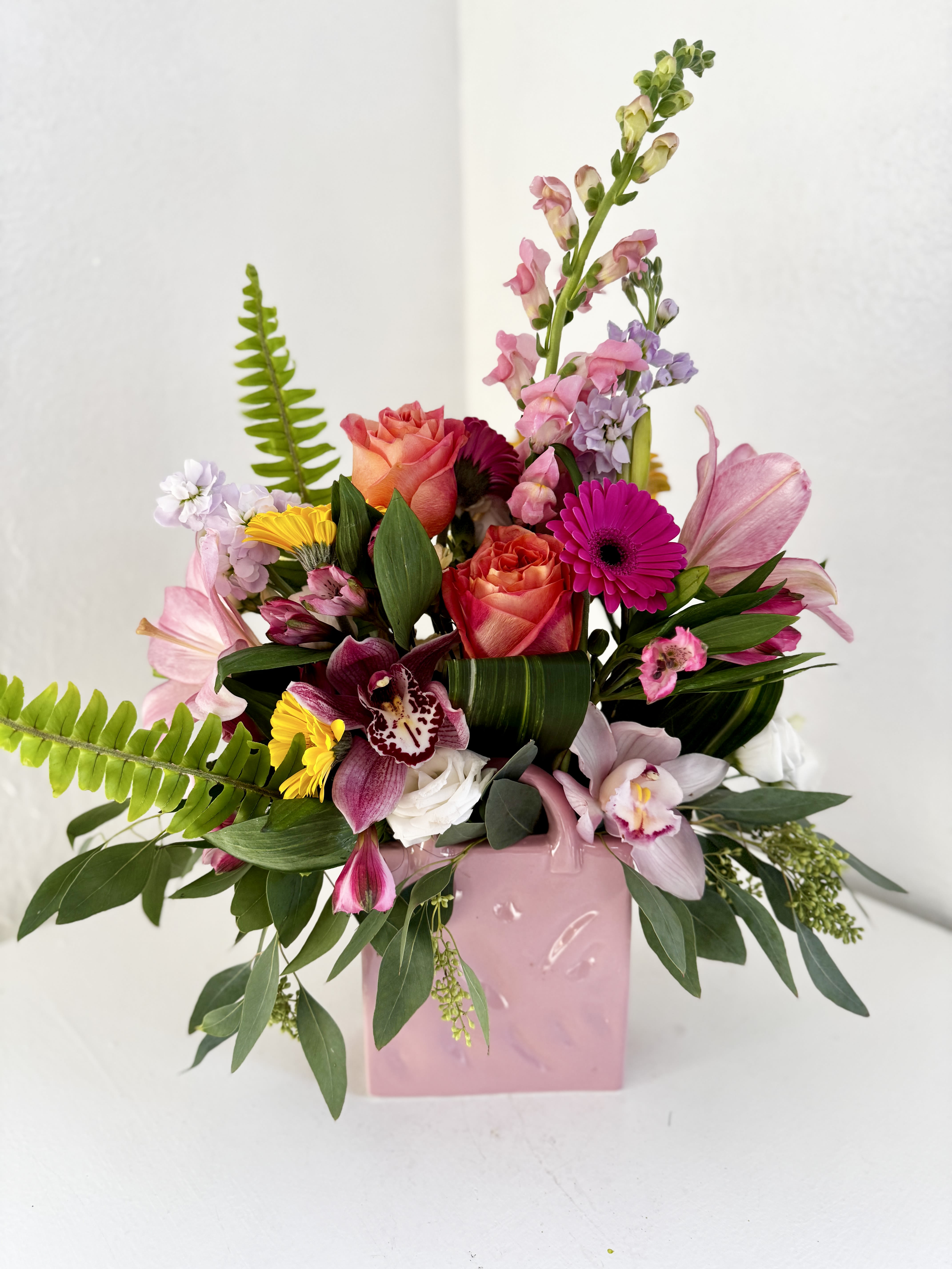 Blooming Handbag - Give the gift of beauty in a bag with this gorgeous arrangement made in a keepsake ceramic purse!