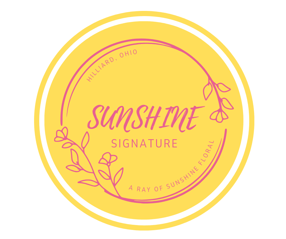 Sunshine Signature – Standard - A bright, cheerful arrangement designed to capture the warmth and beauty of fresh, seasonal flowers. Our Sunshine Signature is thoughtfully crafted in our Hilliard studio, making it perfect for birthdays, celebrations, or just because.  Each arrangement is uniquely designed using the freshest available flowers… colors and blooms may vary while maintaining the overall sunny, uplifting style.  Local pickup and delivery available.