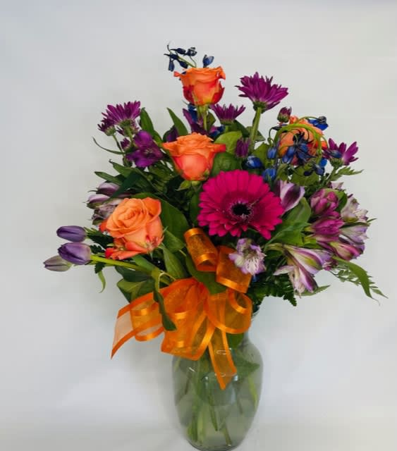 Moulin Rouge - Mixed tones and textures, freshly cut and placed in a clear container.