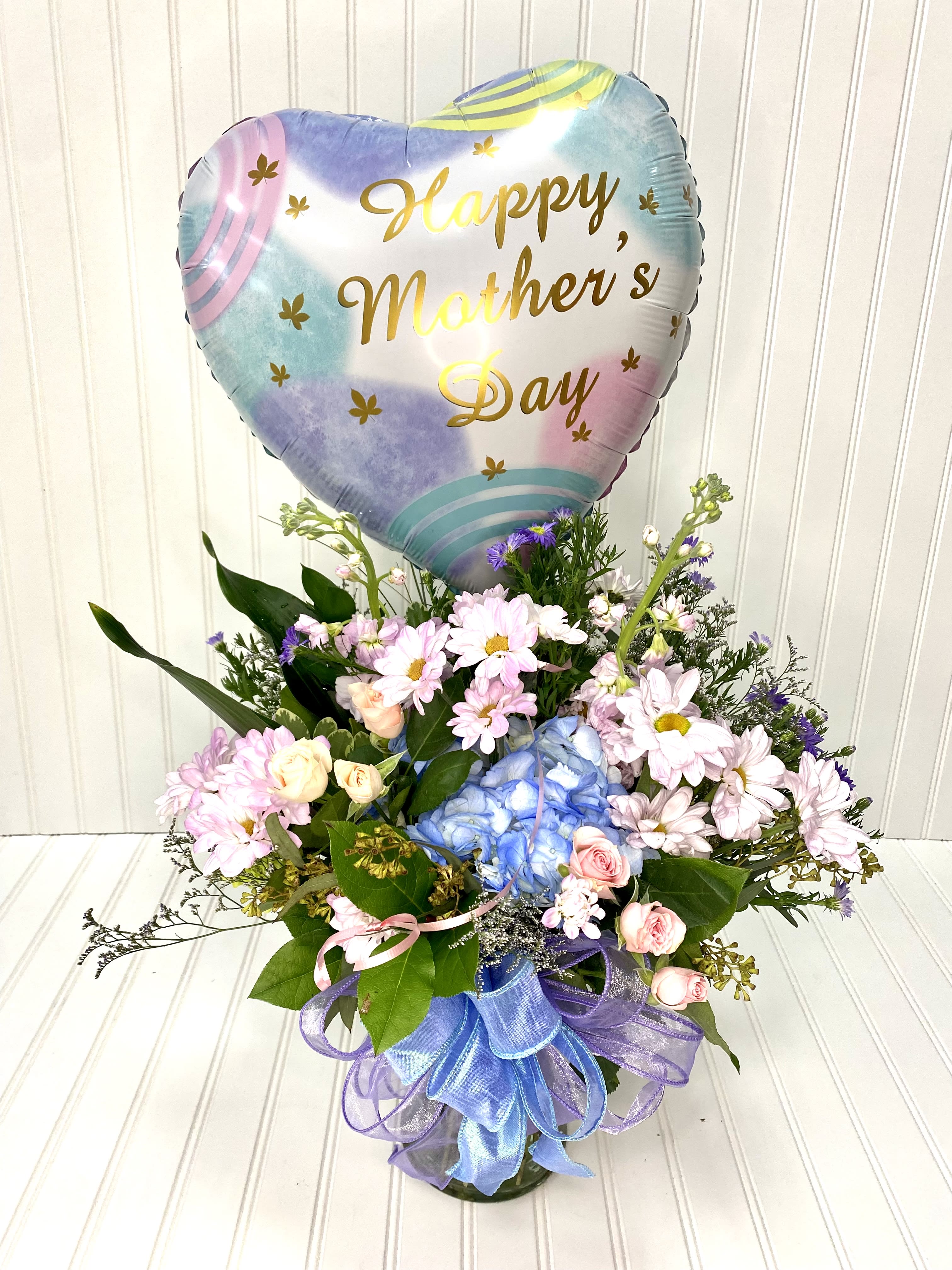 Donna’s Love - A beautiful light and airy arrangement with a balloon wishing your Mom a Happy Mothers Day!!