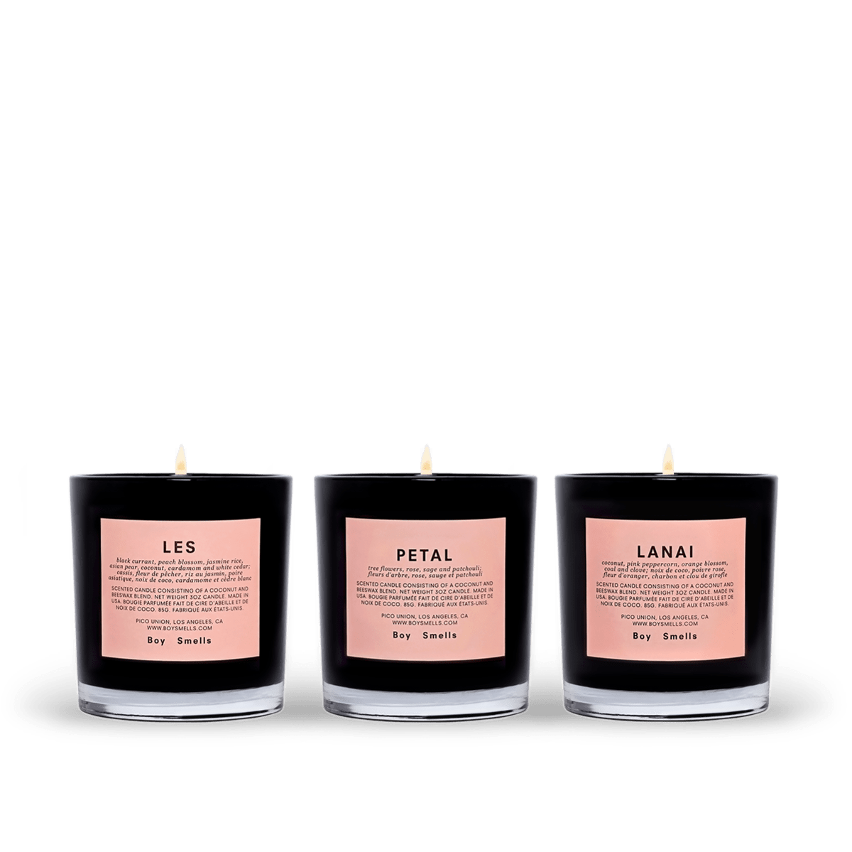 Boy Smells LES, Petal, Lanai Votive Set - A votive set of three candles; petite versions of the standard 8.5oz candles.  Spring forward. Smells that make you assume the weather is warmer than it actually is. In this collection, one can discover—  LES  black currant, peach blossom, jasmine rice, cardamom and white cedar  PETAL  tree flowers, rose, sage and patchouli  LANAI  coconut, pink peppercorn, orange blossom, coal and clove    Coconut and beeswax blend with braided cotton wick, in glossy black glass tumbler. Comes in embossed matte pink sleeve and embossed matte black tray. 3 ounces each (85g). 9 ounces total (255g). 2.5 inches (6.4cm) tall.