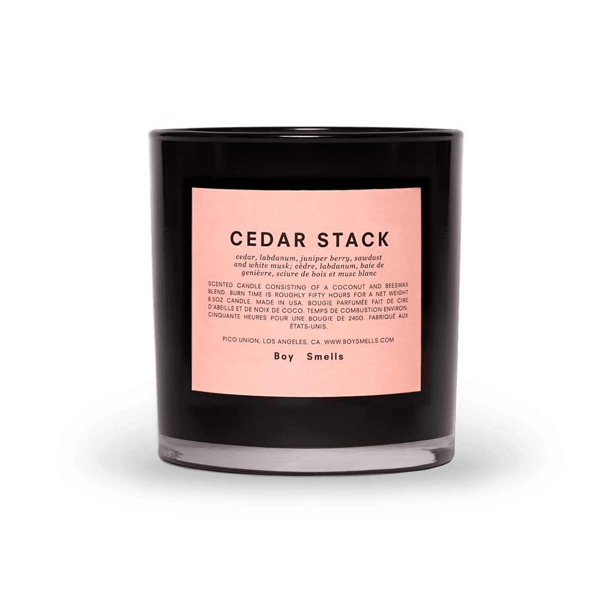 Cedar Stack Boy Smells - cedar, labdanum, juniper berry, sawdust and white musk  A prettier take on the classic wood scent—cedar chips and dried tobacco are led into deeper spiced floral notes of labdanum, while notes of peppercorn add a light bite to this smell, both modern and nostalgic. It's instant glamping in candle form.  Coconut and beeswax blend with braided cotton wick, in glossy black glass tumbler.   Comes in embossed matte pink carton.  8.5 ounces (240g). 3.4 inches (8.6cm) tall.