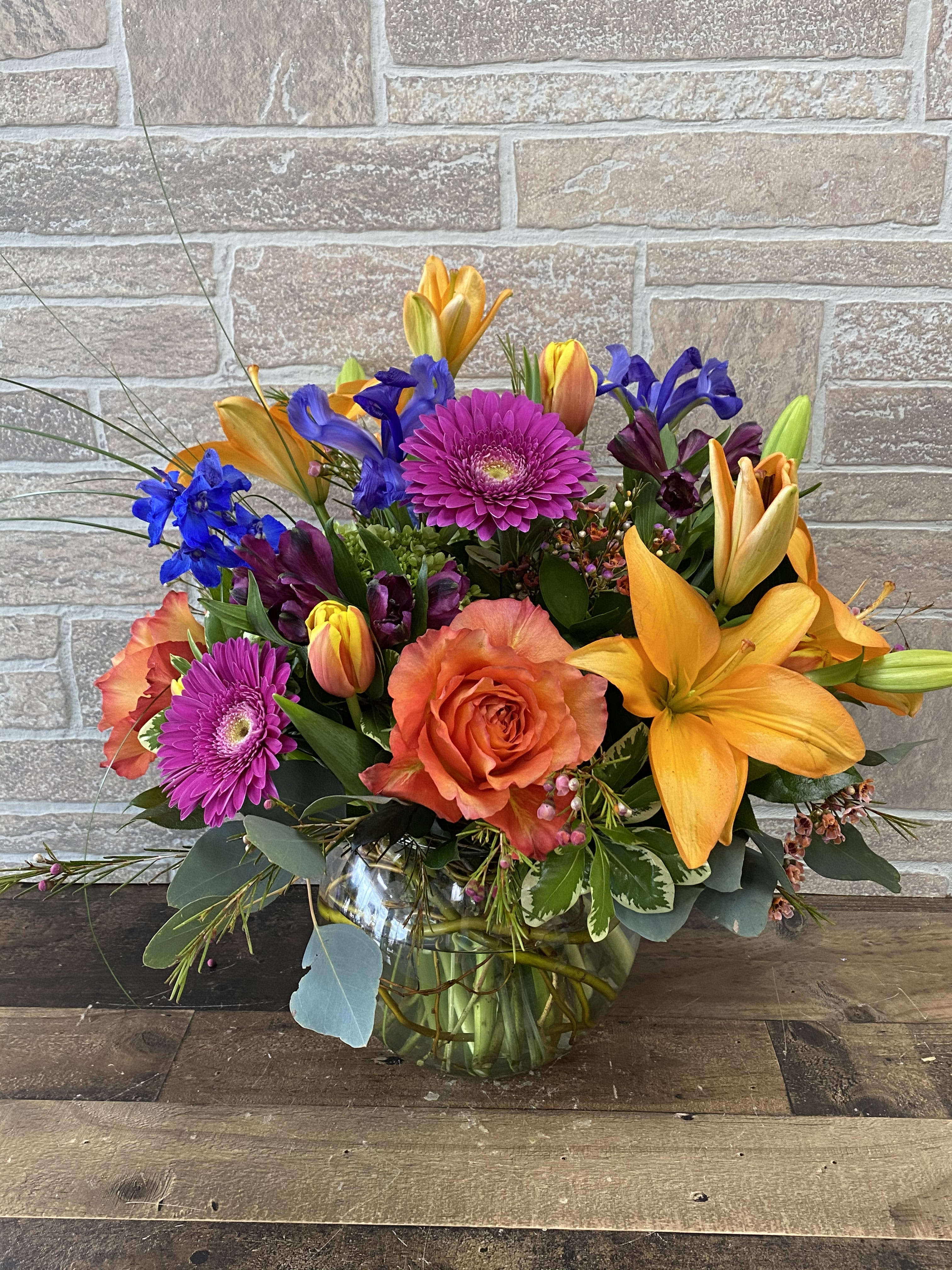 The Jacqueline - Bright and colorful blooms in this fun trendy bubble bowl. Named after my own mother who is just as wonderful and colorful as this bright bubble bowl of fresh blooms.