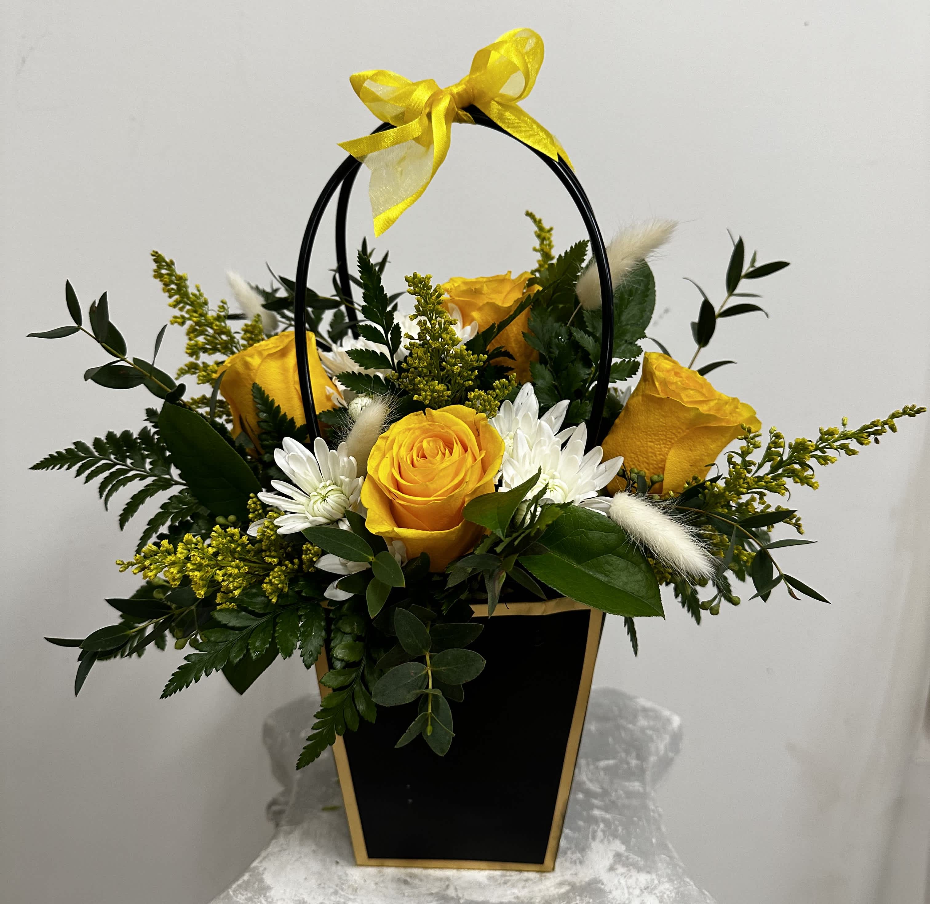  You're beautiful by Westford Florist Art by Veny - Elevate your space with "You're Beautiful" by Westford Florist Art by Veny. This exquisite arrangement showcases radiant yellow roses, symbolizing joy and friendship, artfully blended with delicate white blooms and lush green foliage. Each element is thoughtfully curated to create a stunning visual impact that brightens any room or occasion. Perfect for gifting or enhancing your home decor, this piece embodies elegance and warmth—an ideal choice for those who appreciate the finer details in life. Experience the beauty of nature, redefined through expert artistry.