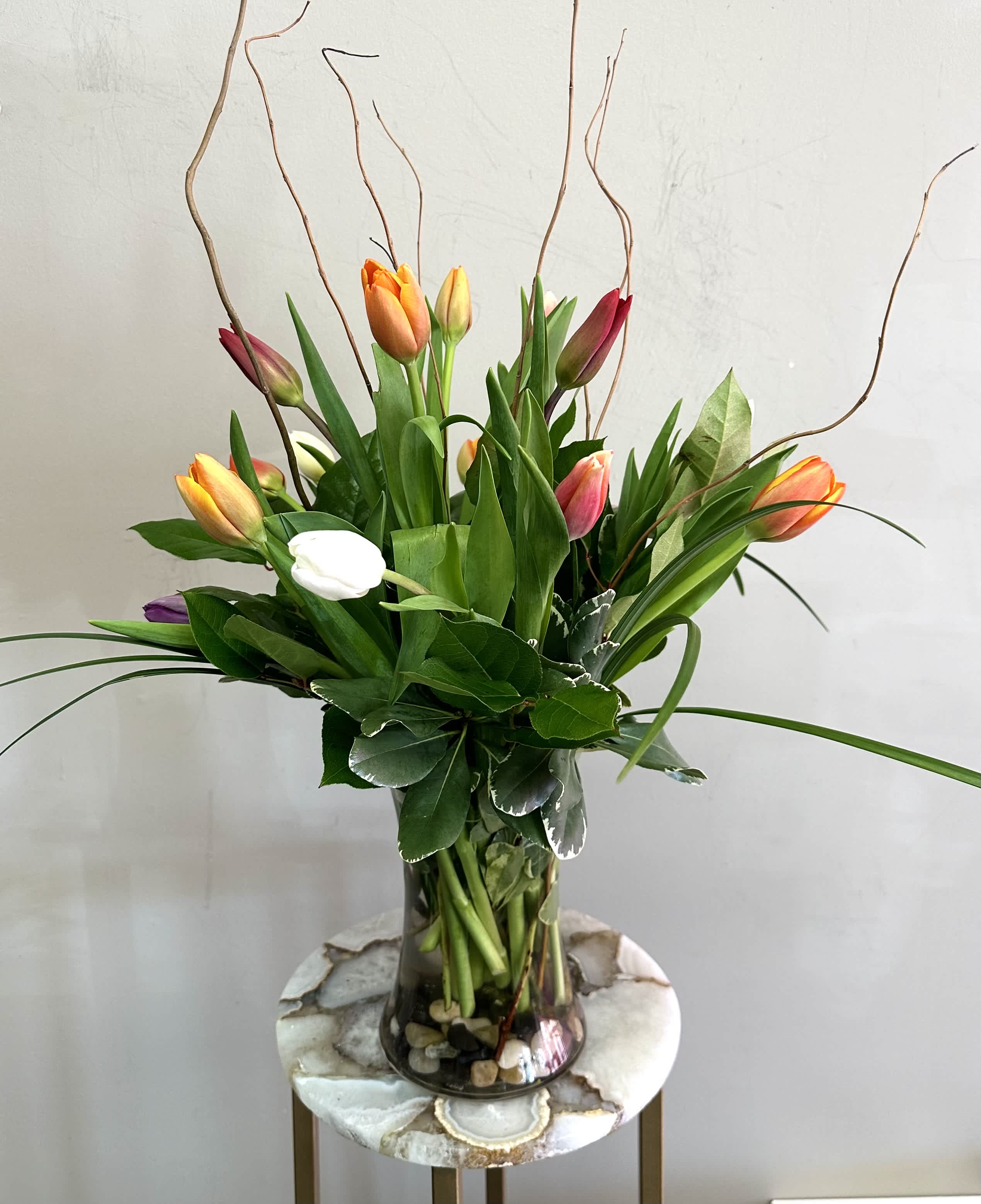 Tulips in Pebble Creek - A spring vase of multi-colored tulips to brighten any room!   
