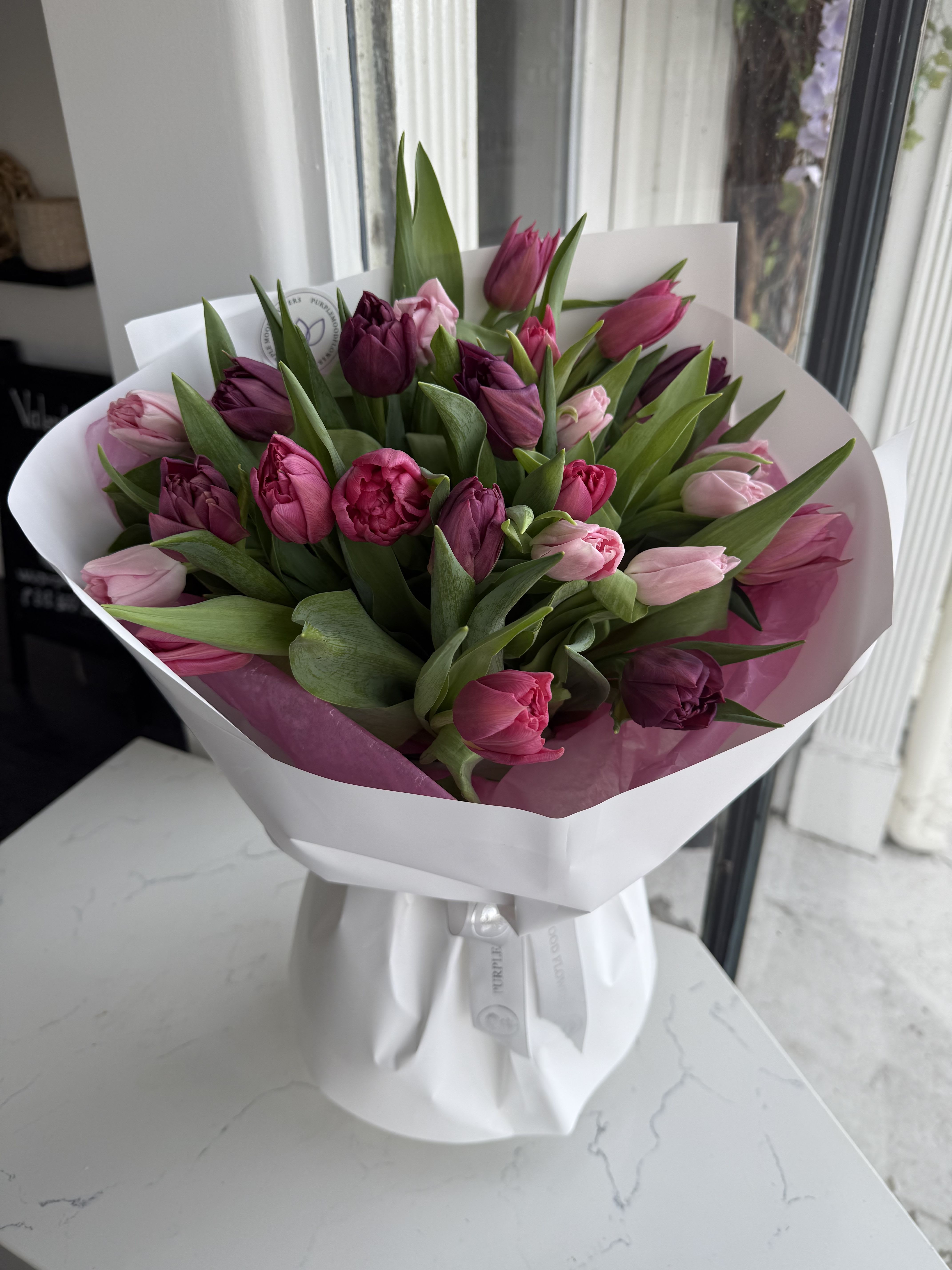 2 dozen tulips bouquet - Standard 2 dozen (24 stems) Deluxe 3 dozen (36 stems)  Premium 4 dozen (48 stems) Vase not included