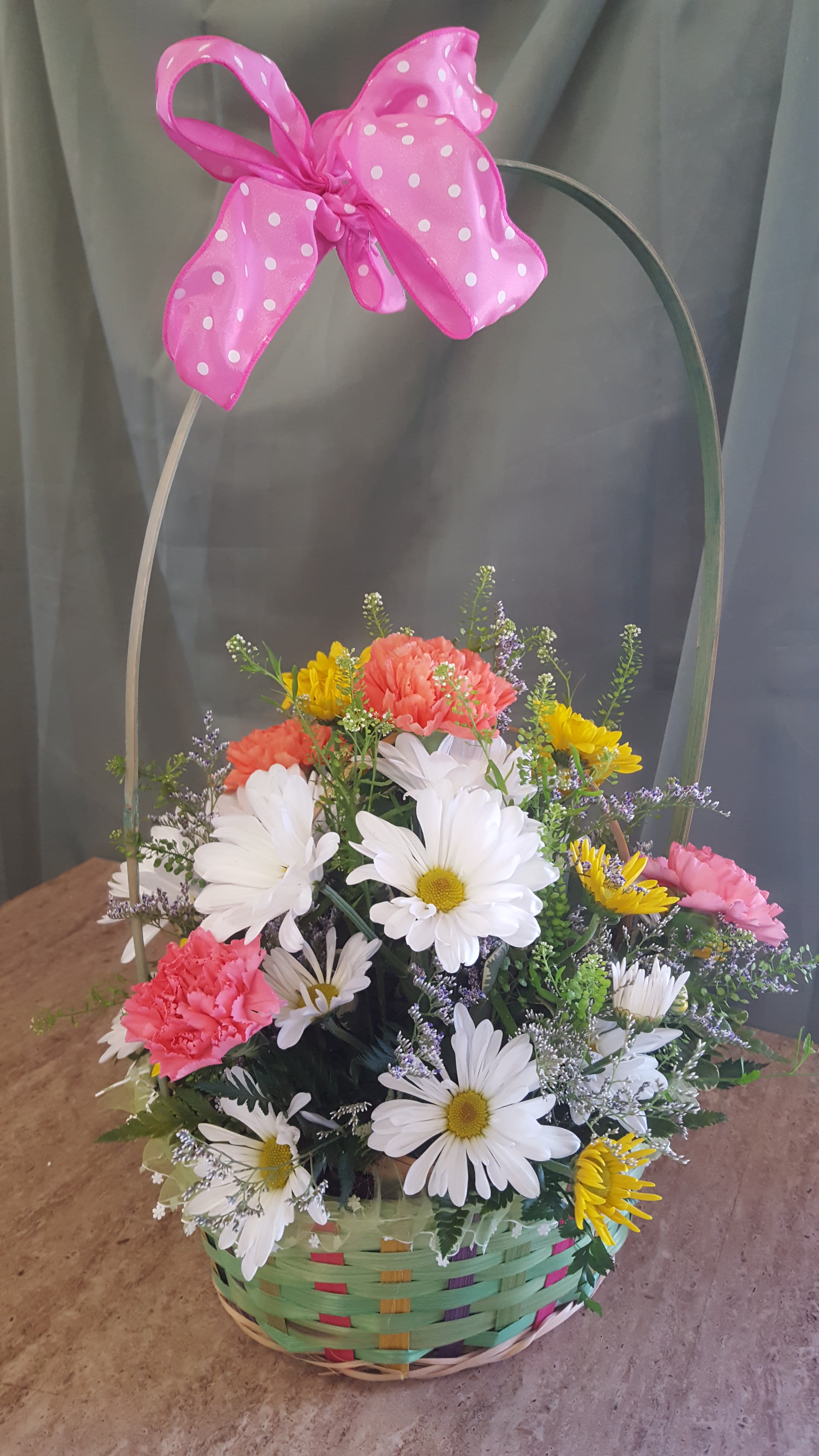 An Easter Basket! - A tis-kit a tas-kit, send someone you love an easter basket!!  A large fun oversized basket filled with sunny daisies, carnations, filler flowers and easter grass