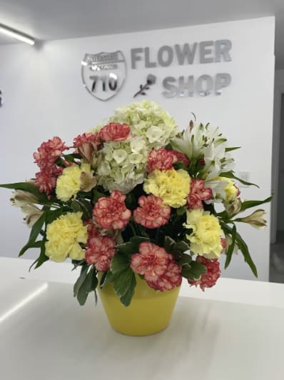 Golden Morning - A fresh, uplifting energy of the yellow and white blooms in the yellow vase—like the soft, golden light of a new day. (If you'd like to change any colors please leave note in instructions. If some flowers and/or the vase are not available there will be mi