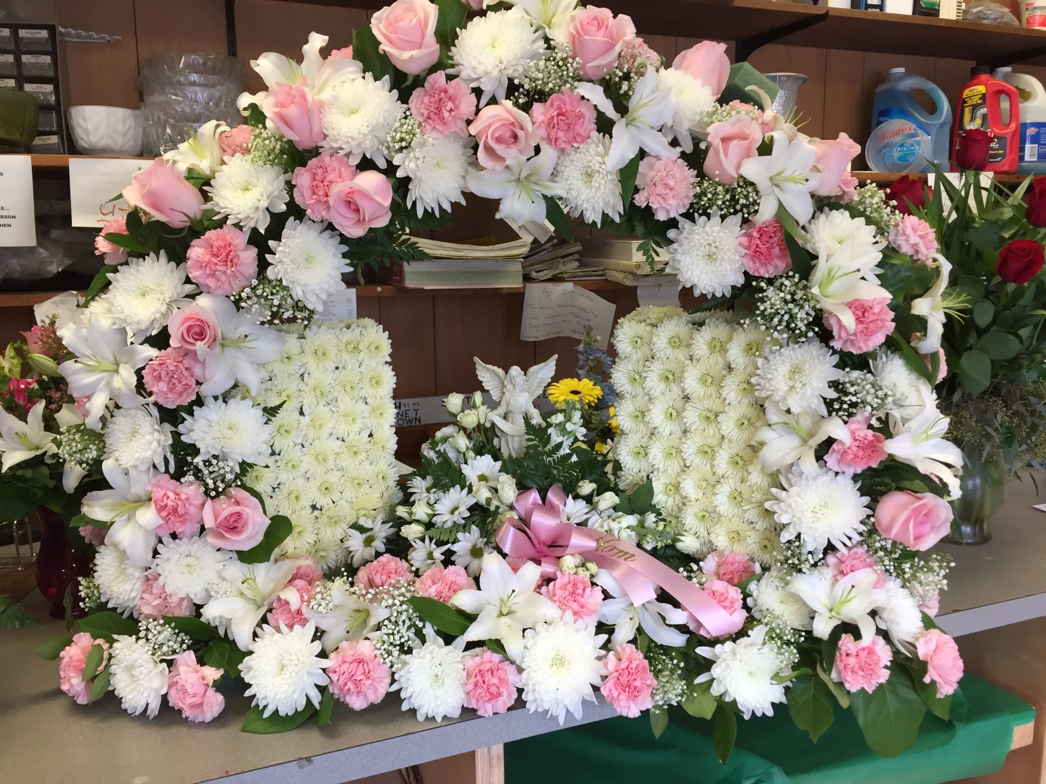 Gates of Heaven - Mixed flowers, your choice of colors. Approx 36" x 30" high Includes religious statue in the open gates.