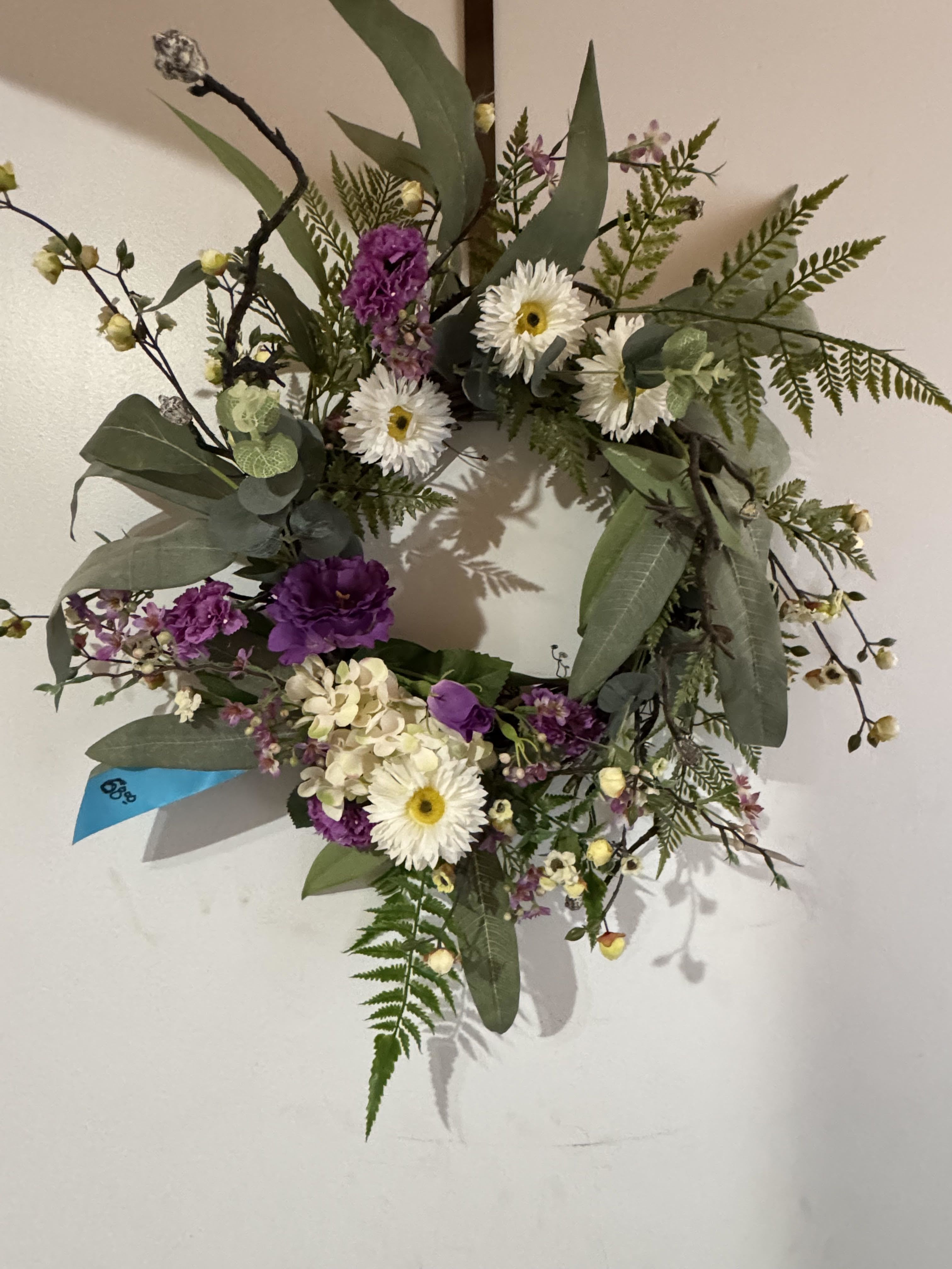 GENTLE PLUM (PERMANENT WREATH) - A permanent wreath with white and plum colored faux blooms